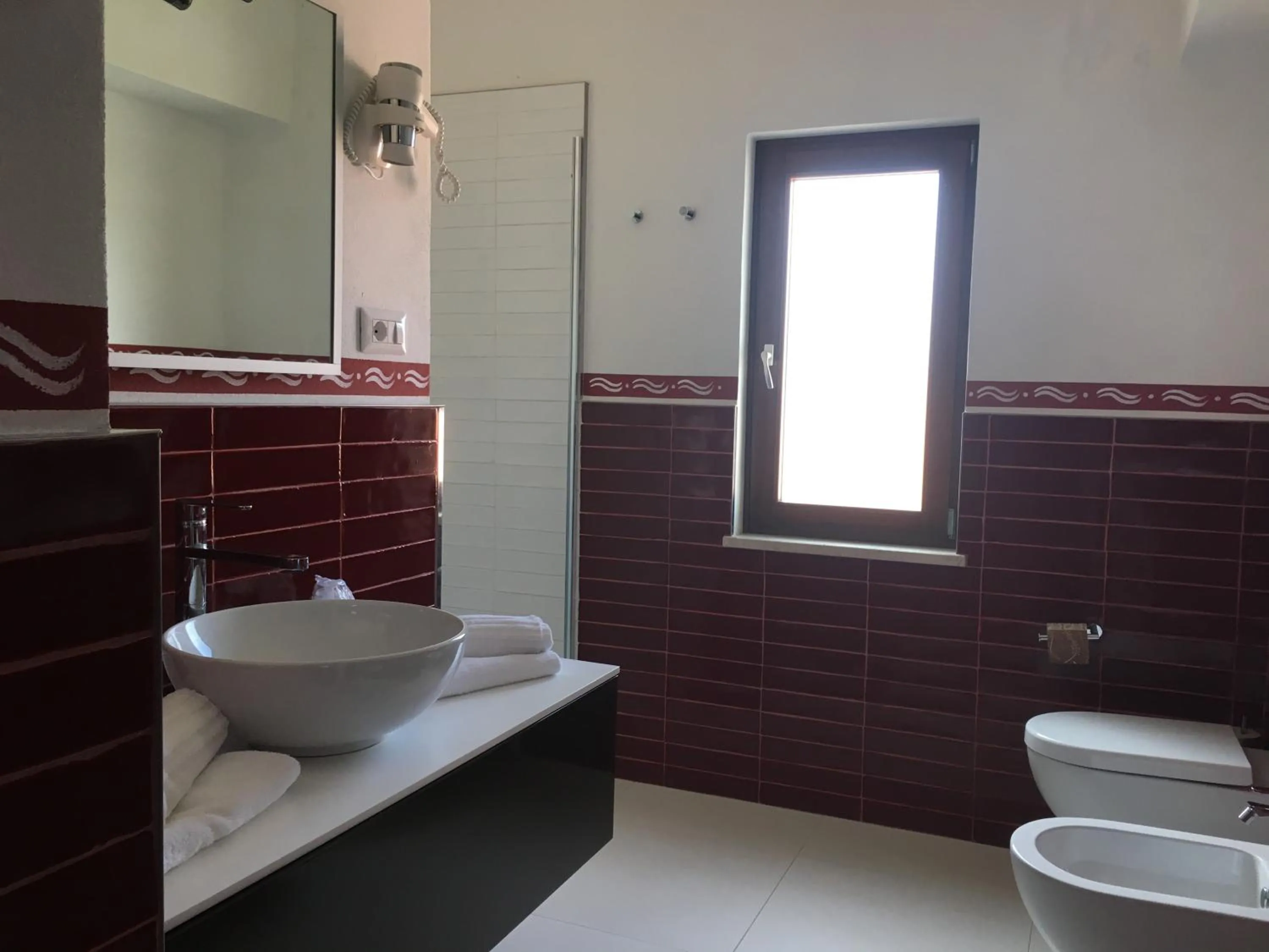 Bathroom in Cala Rosa Club Hotel