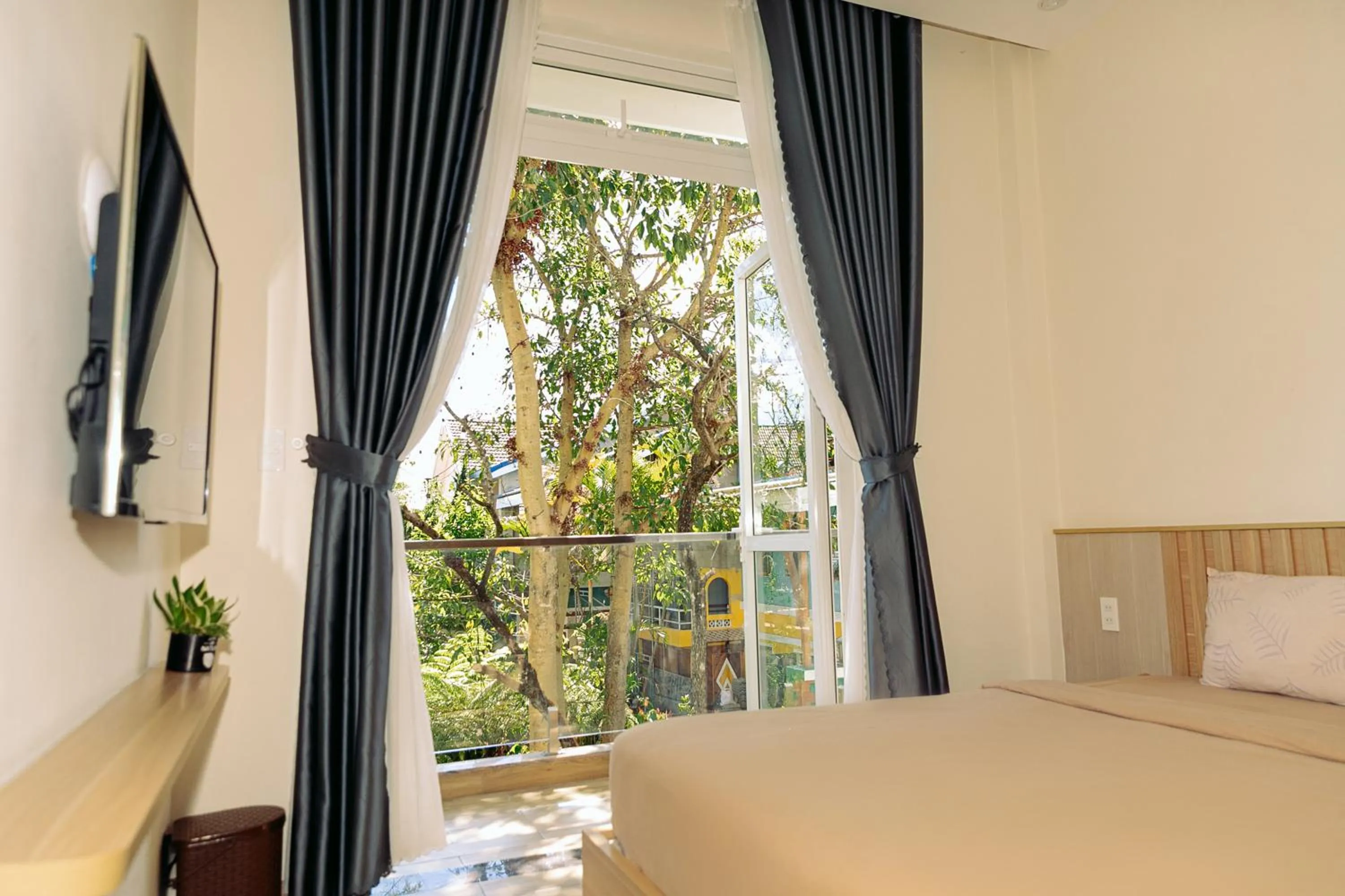 Bed in An Mai Boutique Hotel