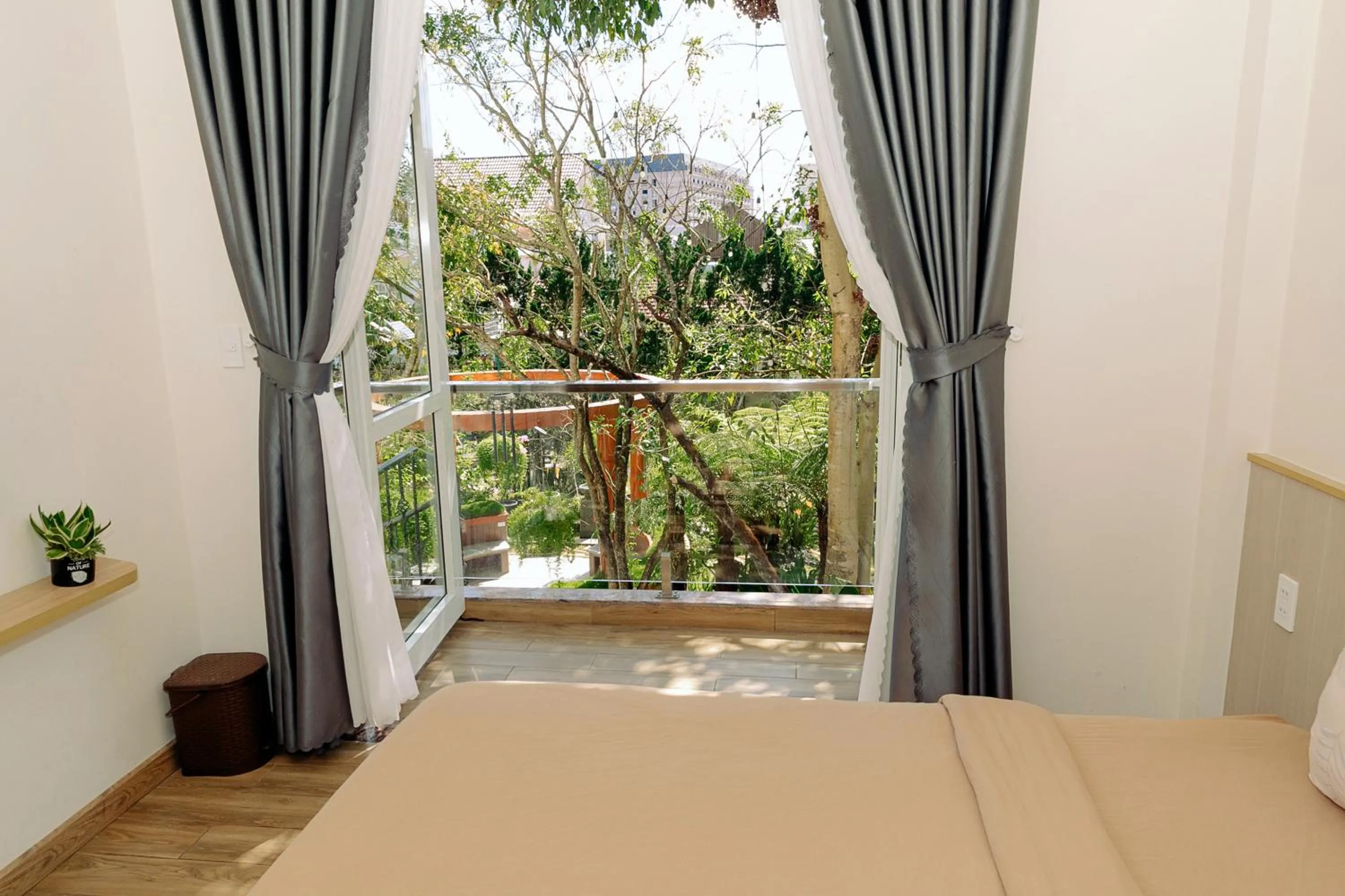 View (from property/room), Bed in An Mai Boutique Hotel