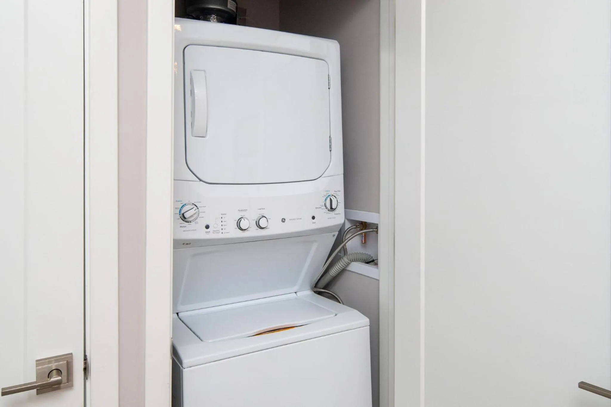 washing machine in Luxury Apartments by Hyatus at Pierpont