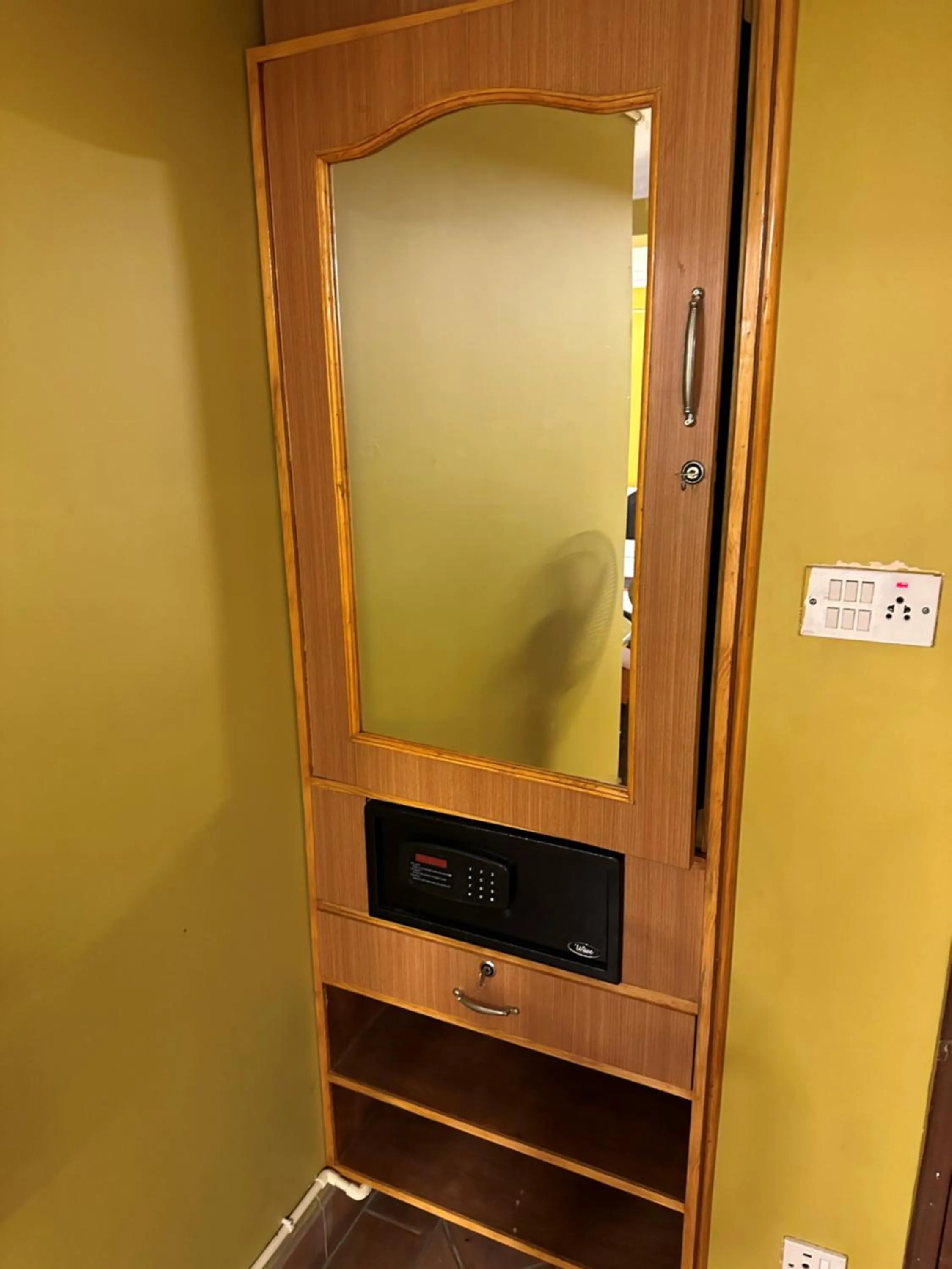 Bedroom in Hotel Empire & Rooftop Restaurant