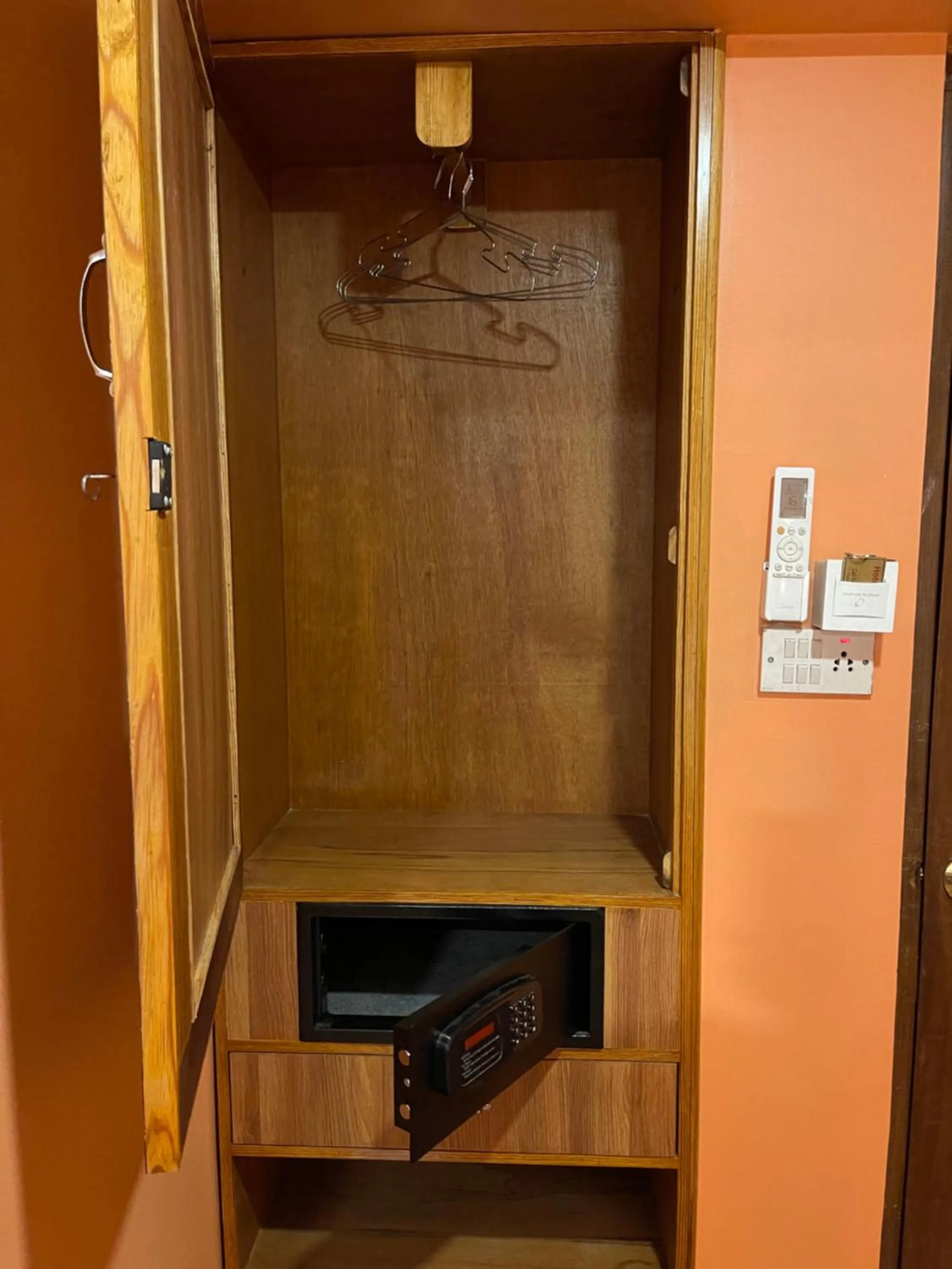 wardrobe in Hotel Empire & Rooftop Restaurant