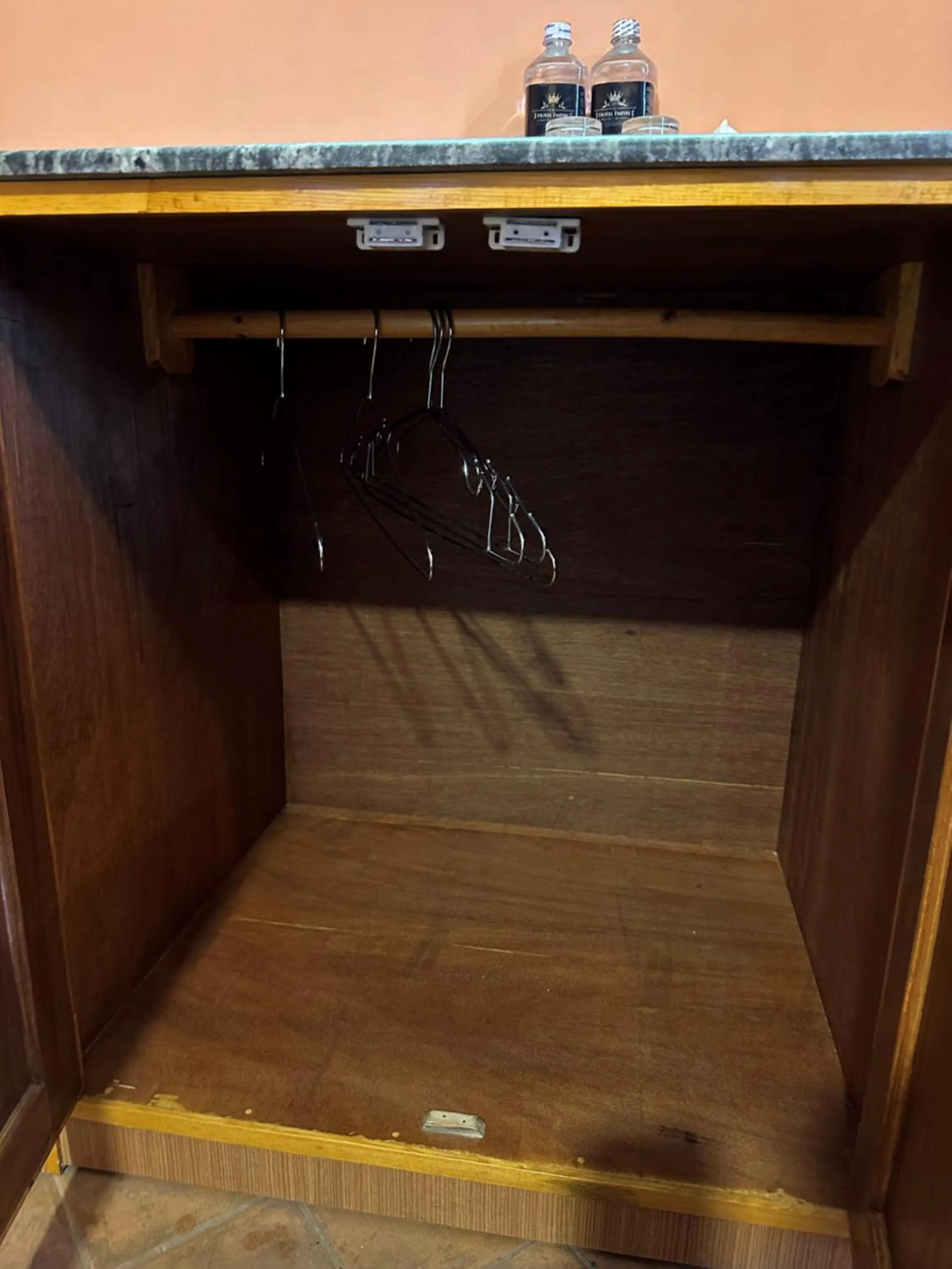 wardrobe in Hotel Empire & Rooftop Restaurant