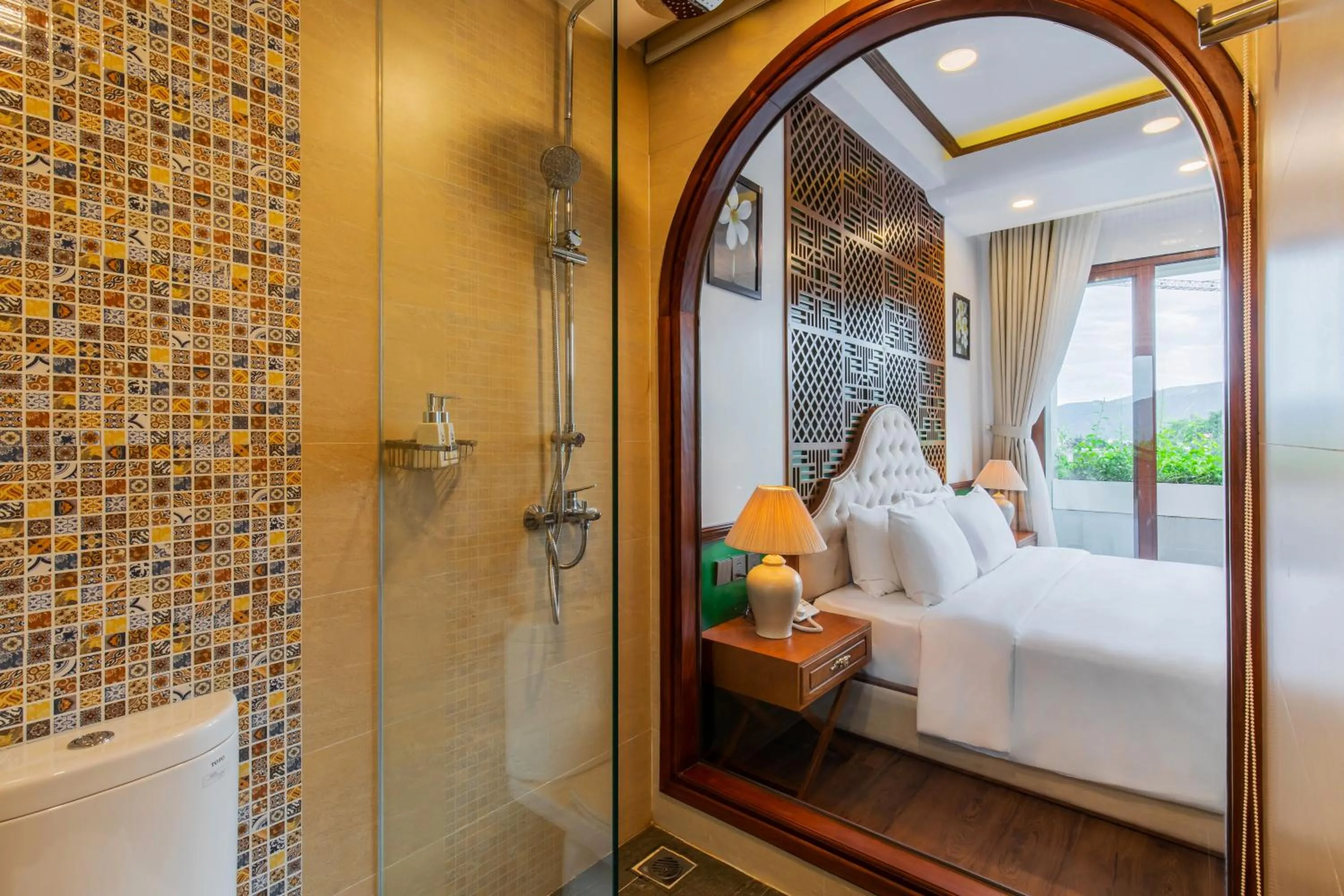 Shower, Bed in Boutik Cham NhaTrang Hotel