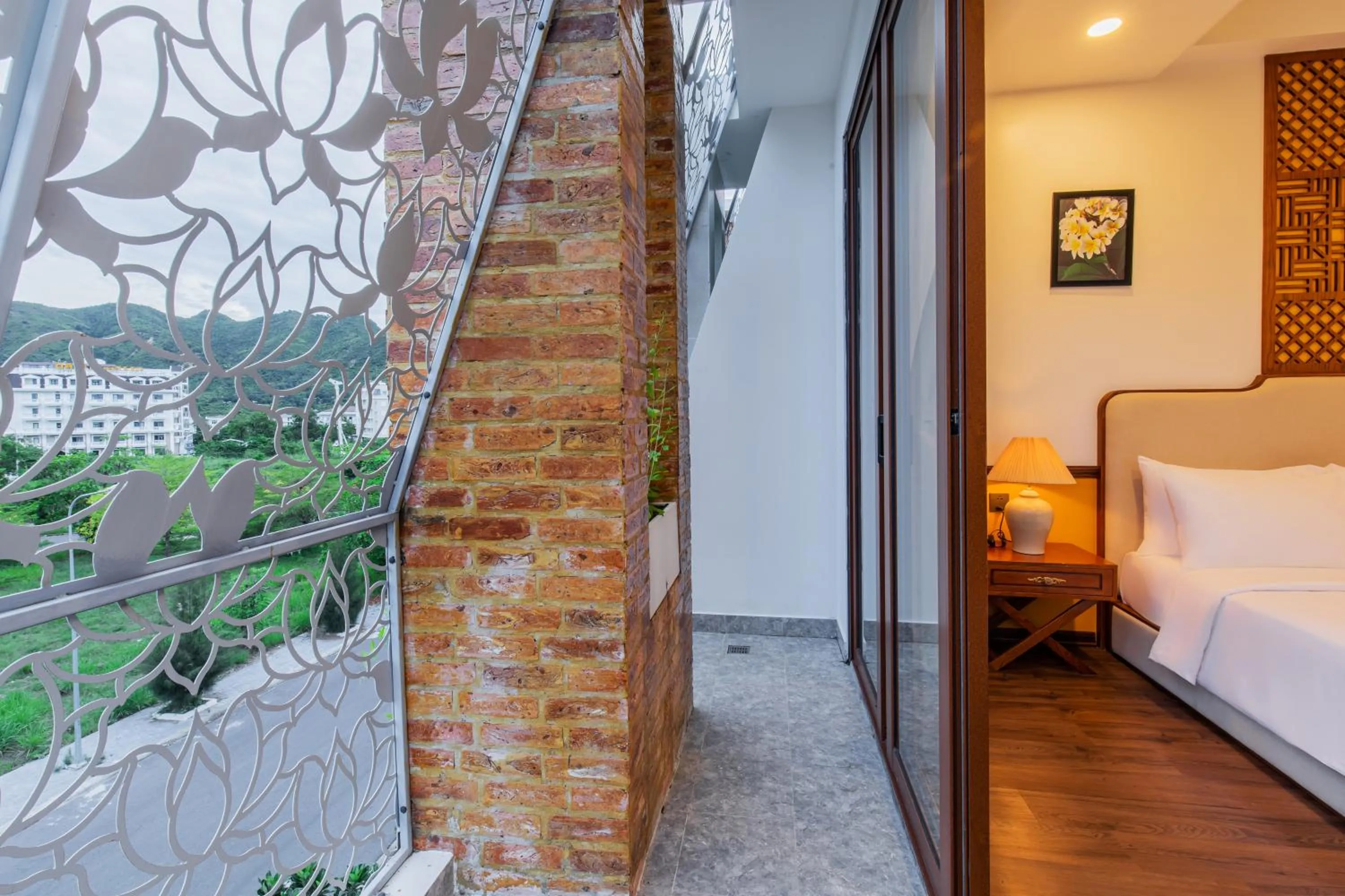 Balcony/Terrace, Bed in Boutik Cham NhaTrang Hotel