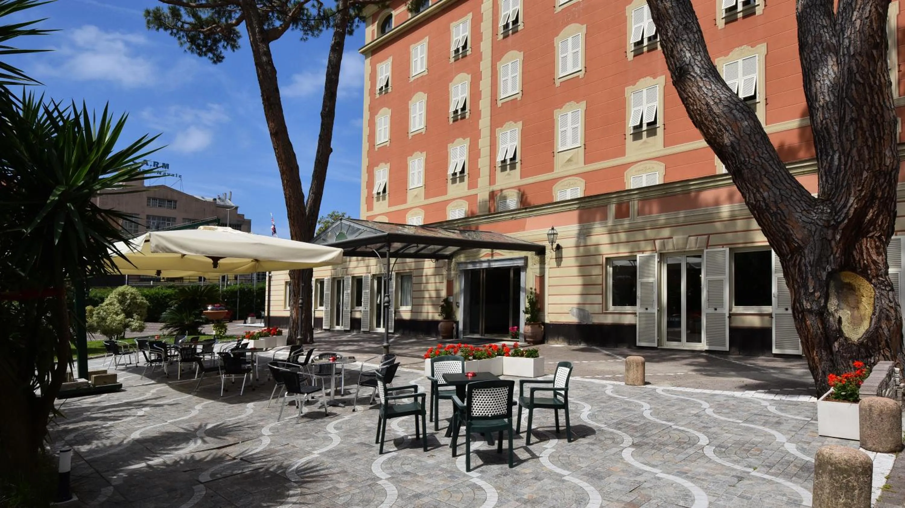 Garden in Hotel Sud Est by Fam Rossetti