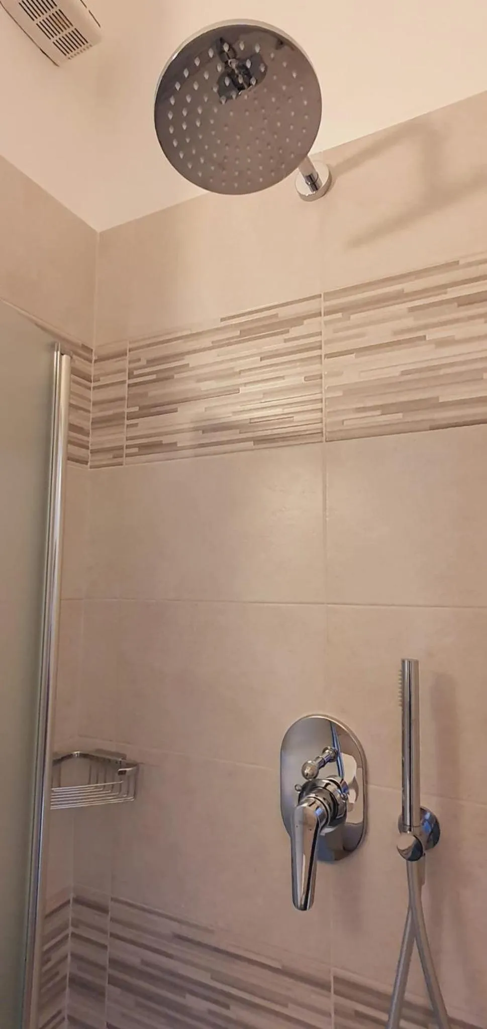 Shower in Hotel Sud Est by Fam Rossetti