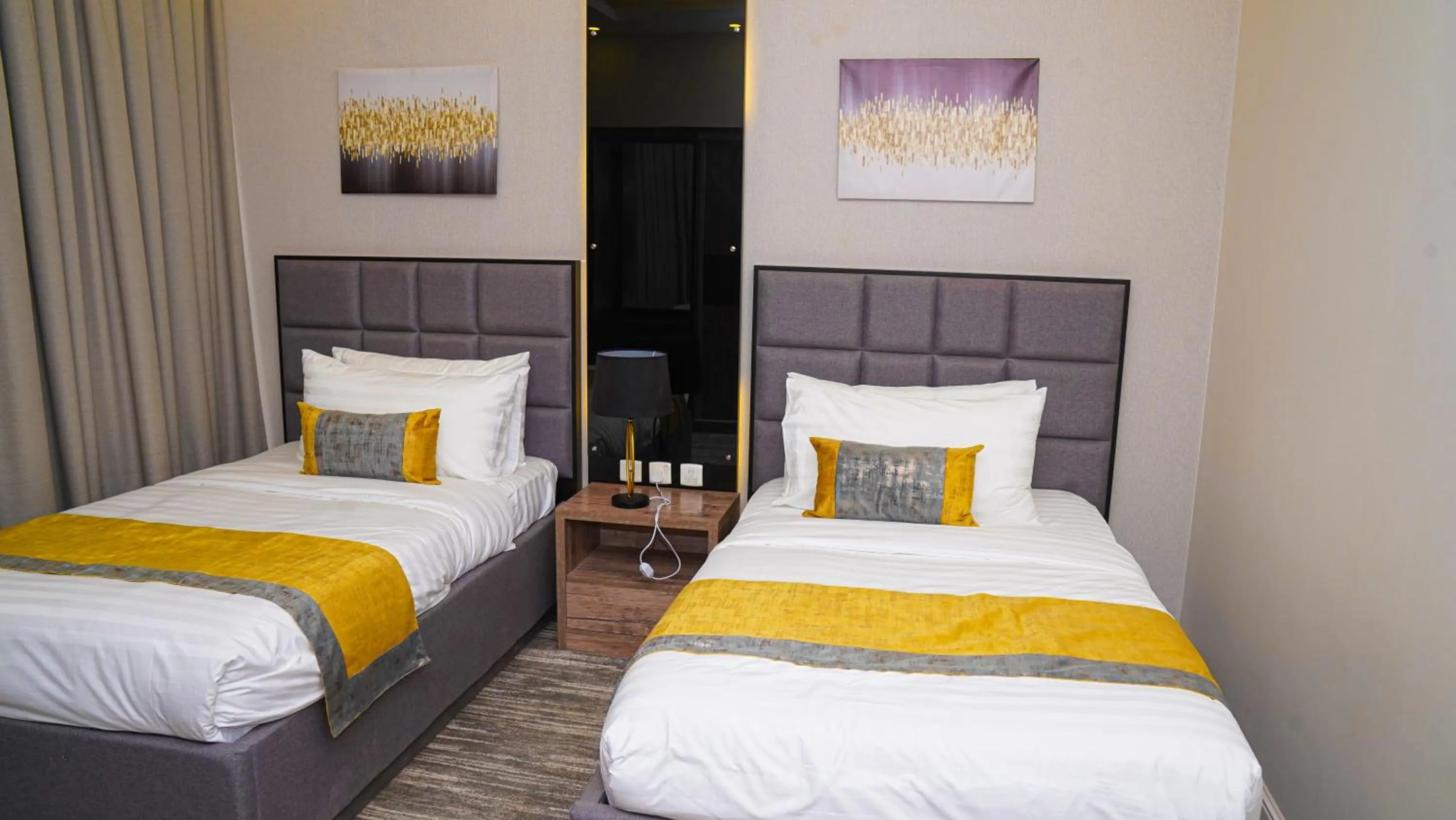 Bed in Clowzer Serviced Apartments