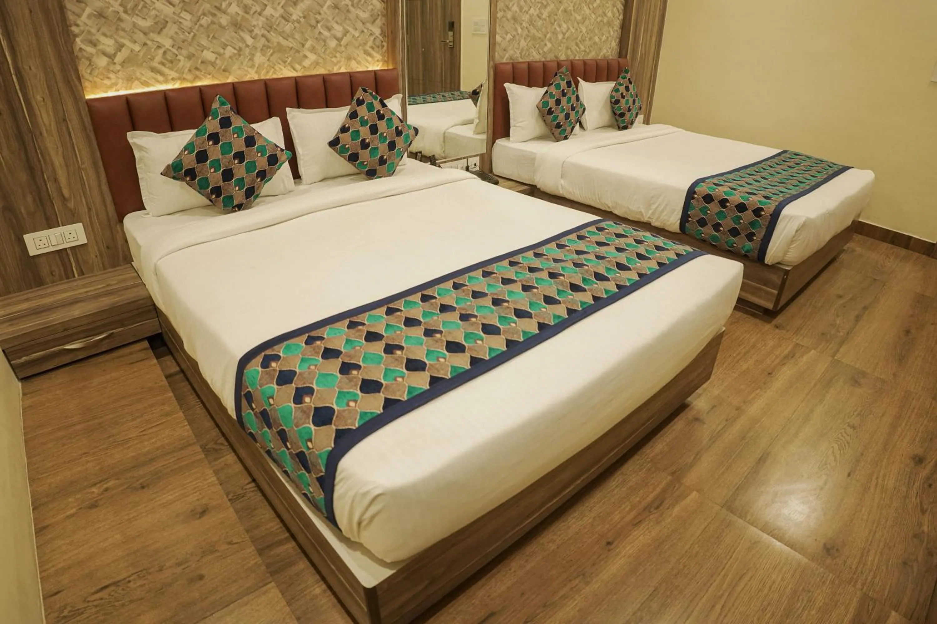 Bed in Hotel Grand Residency