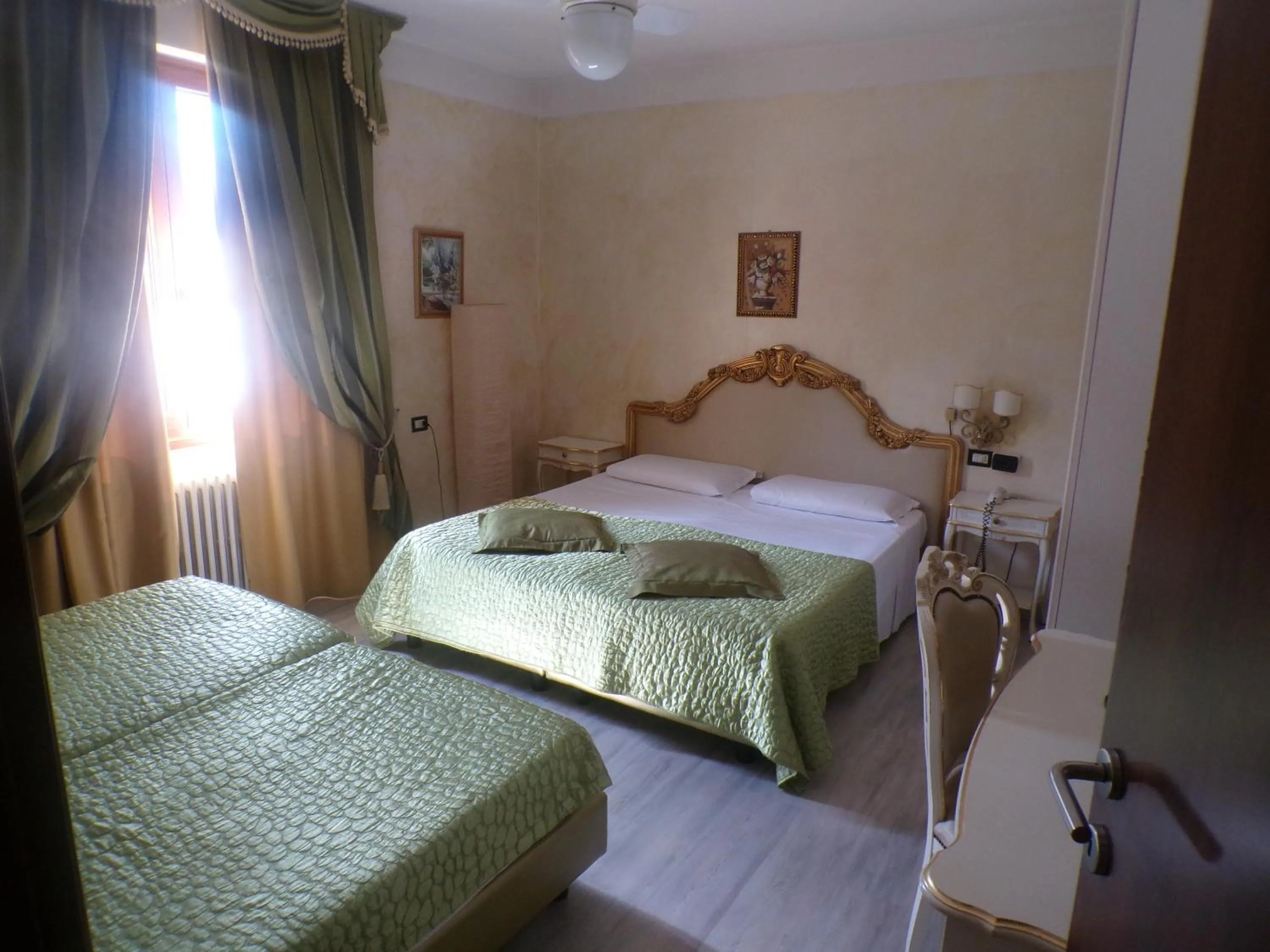 Bed in Hotel San Marino