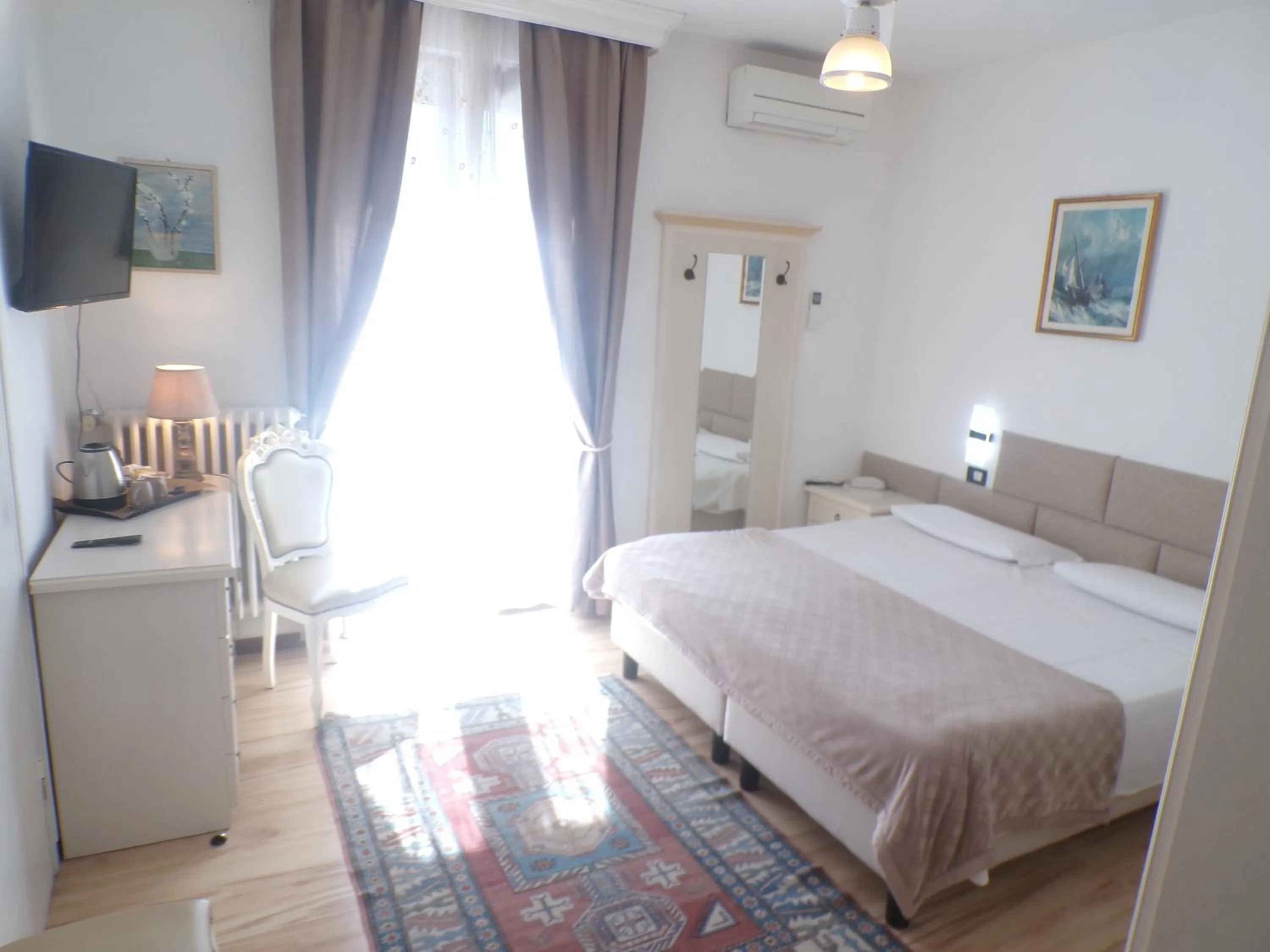 Bed in Hotel San Marino