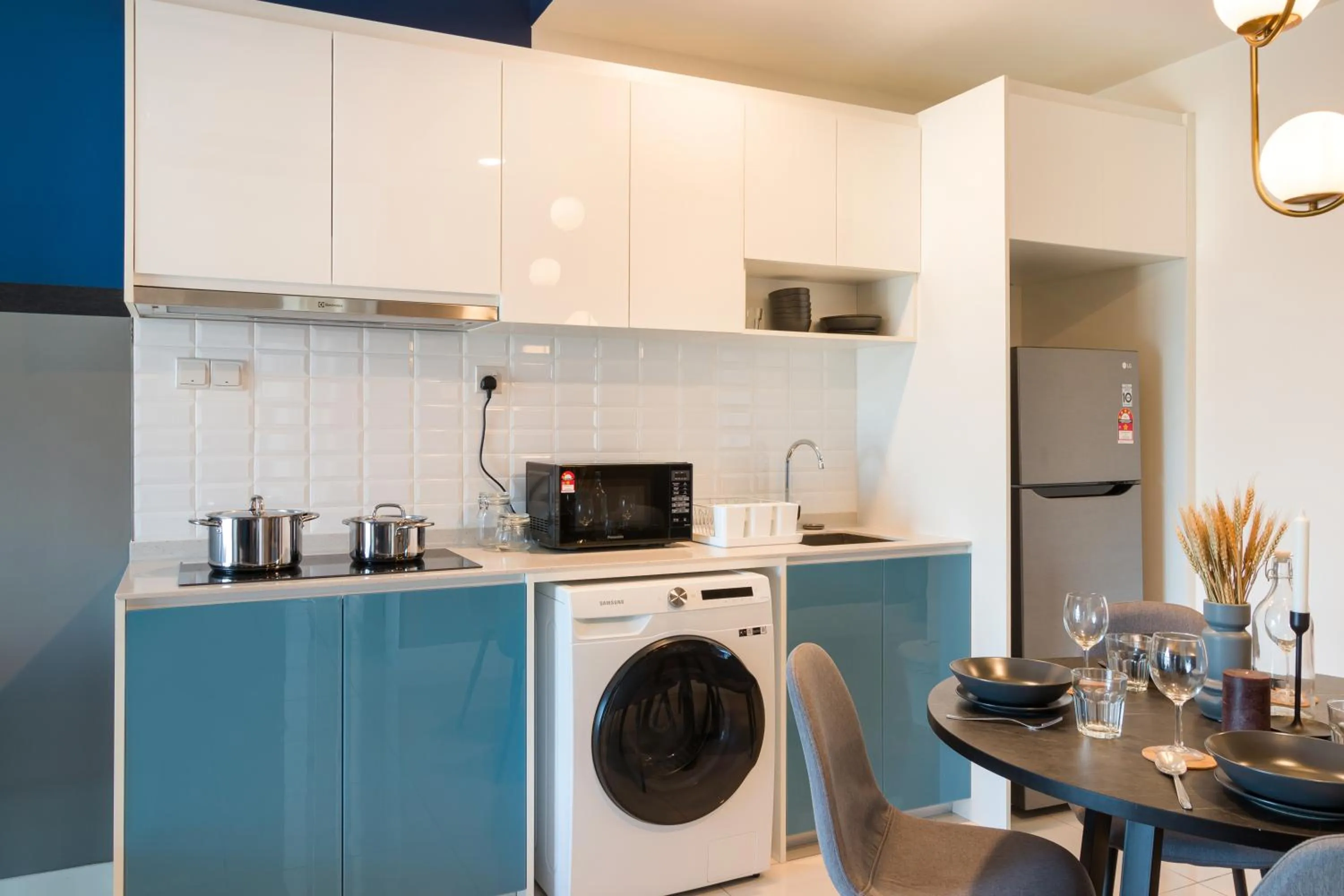 kitchen in Continew Residensi by Airhost