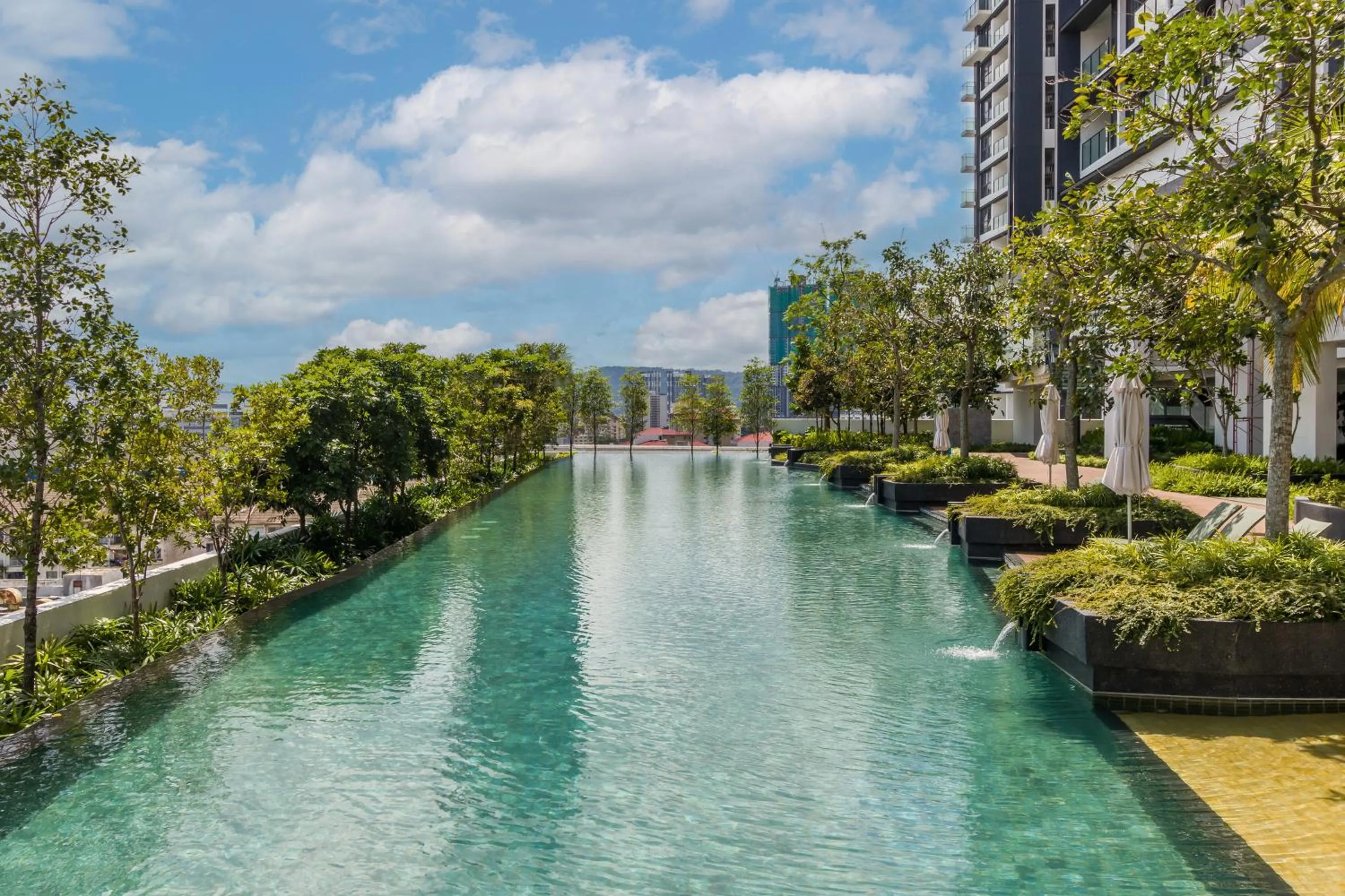Swimming pool in Continew Residensi by Airhost
