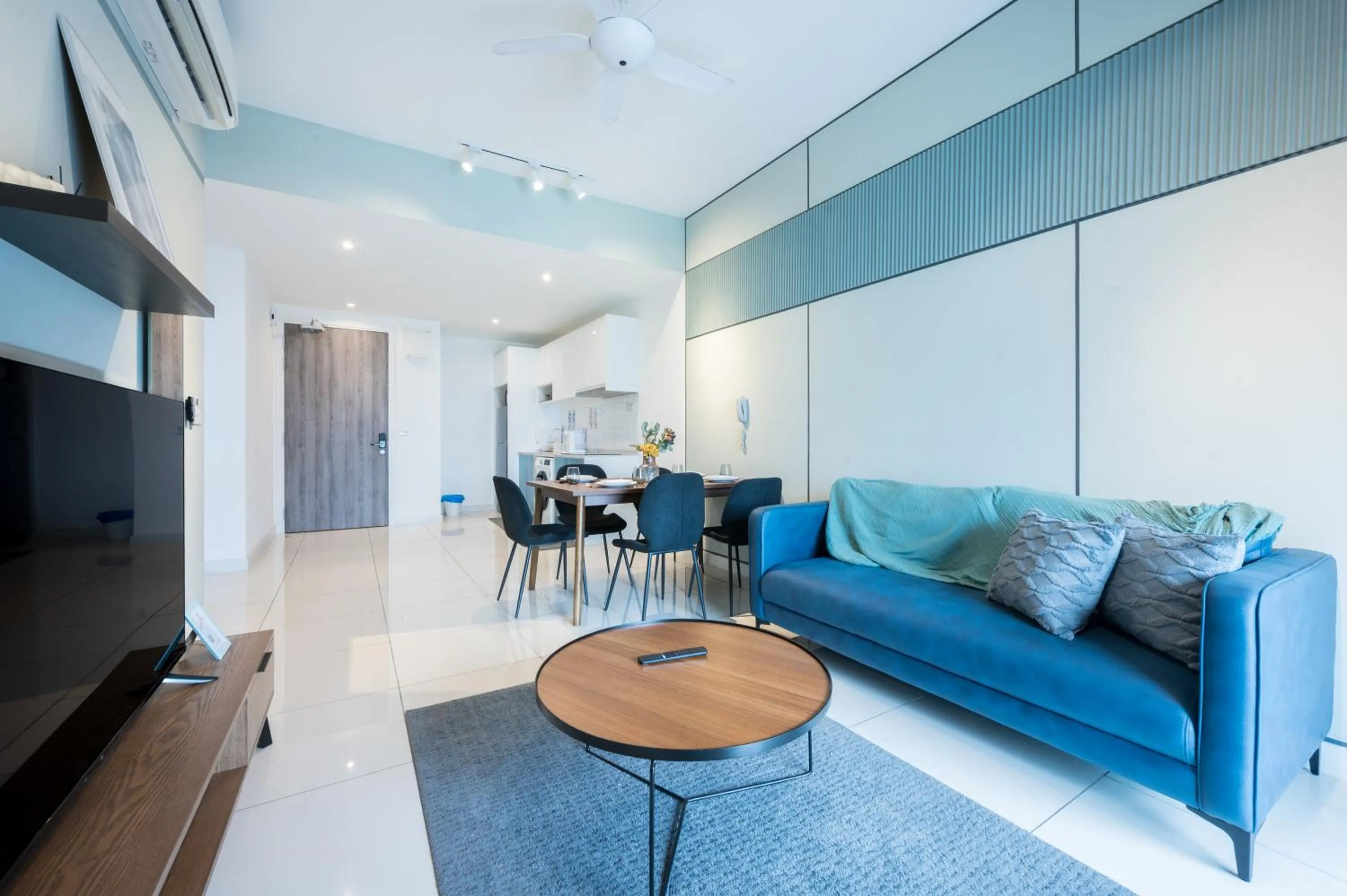 Living room in Continew Residensi by Airhost