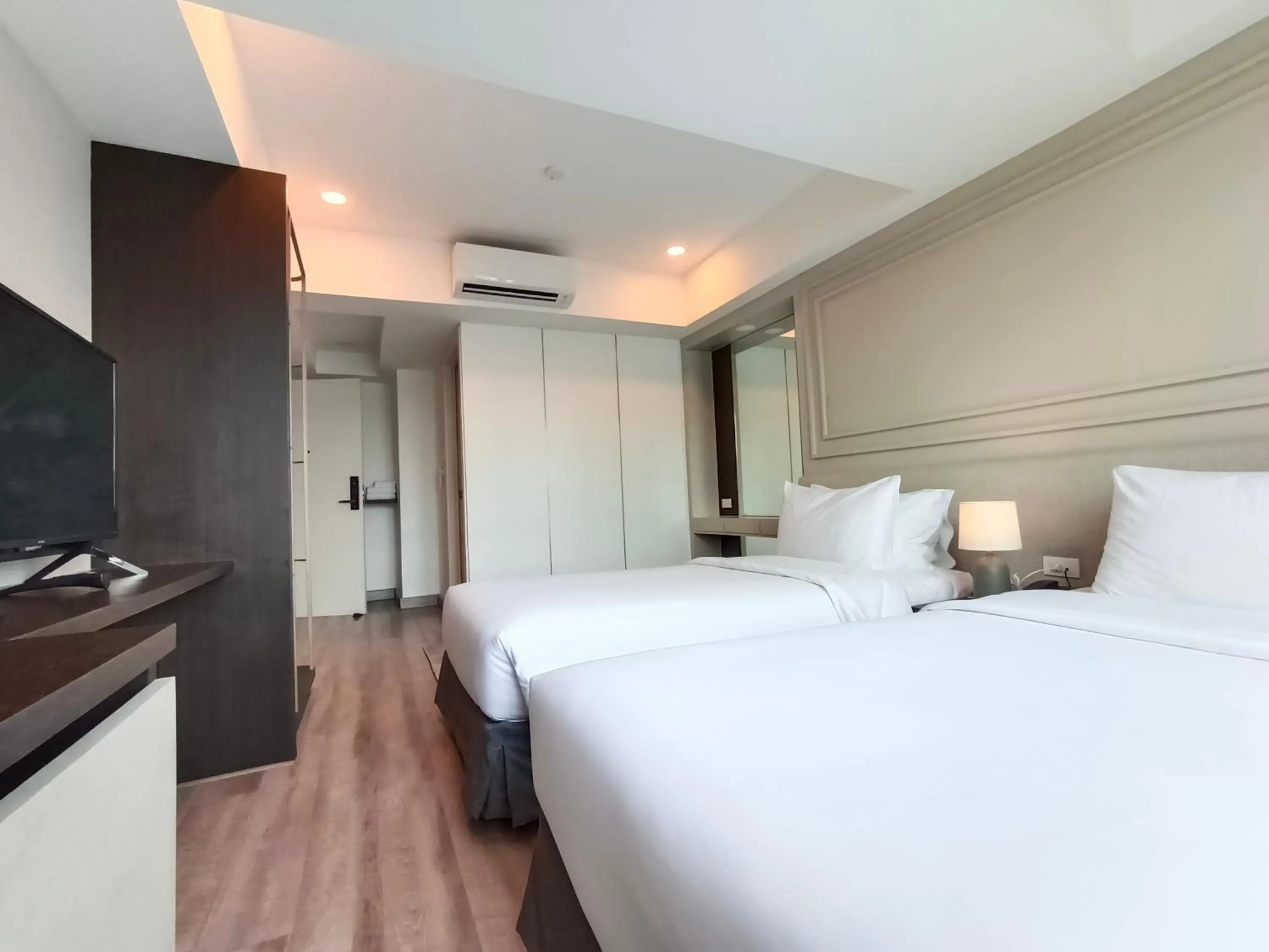 Bed in VIVA LA VIDA HOTEL