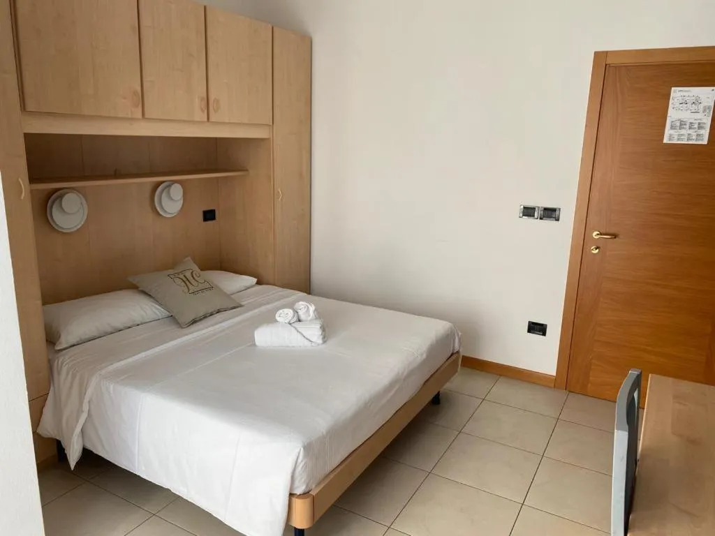 Bedroom, Bed in Hotel Hc Resort Lignano