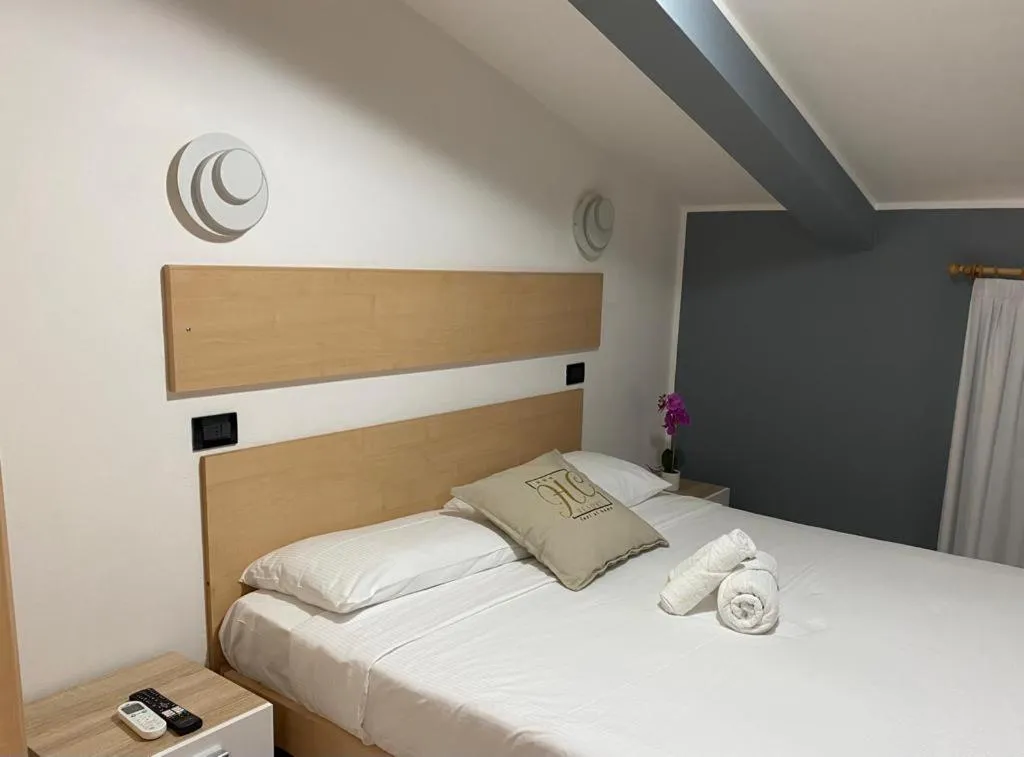 Bedroom, Bed in Hotel Hc Resort Lignano