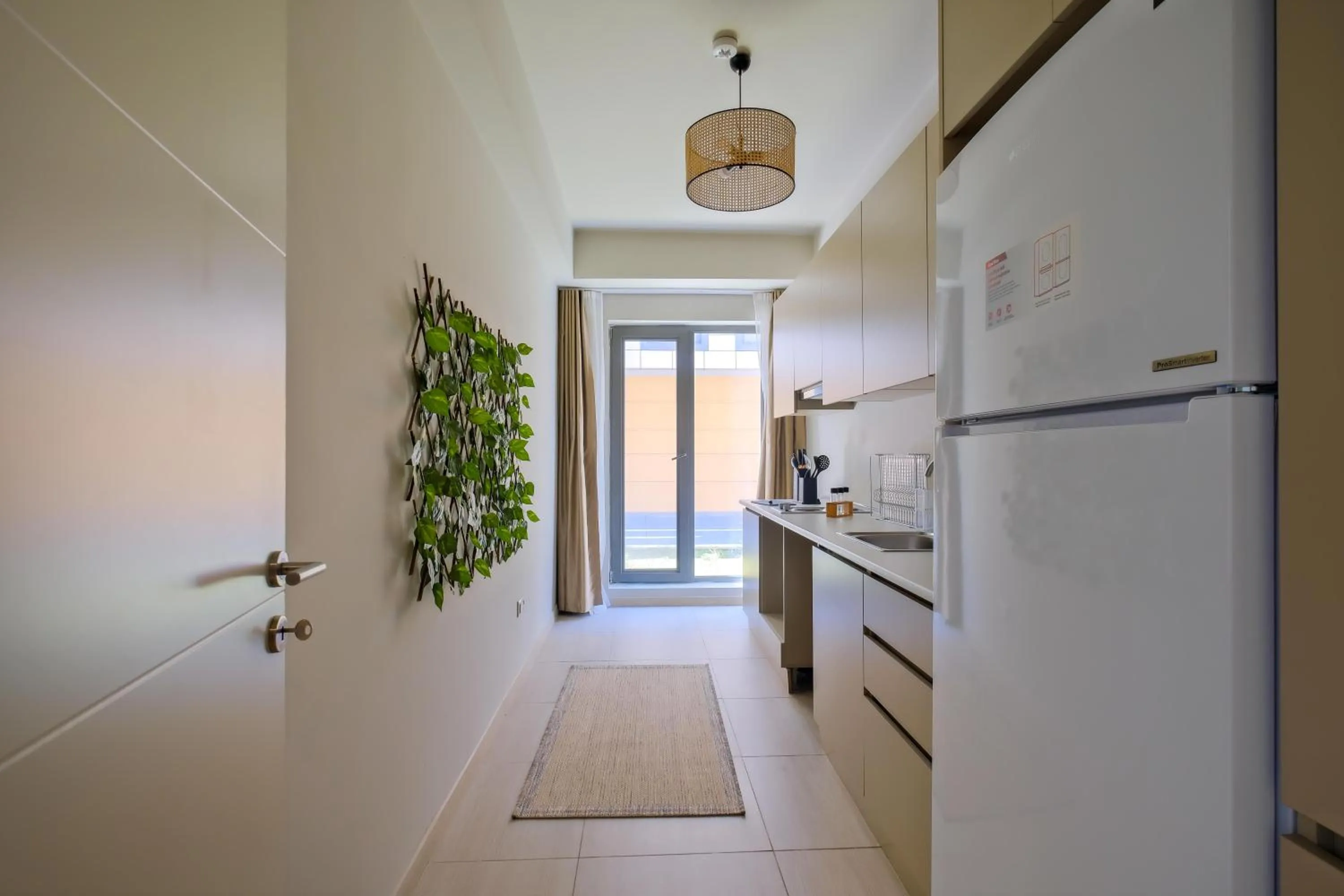 Kitchen or kitchenette in New Inn Hotel Cadde 54 Mall