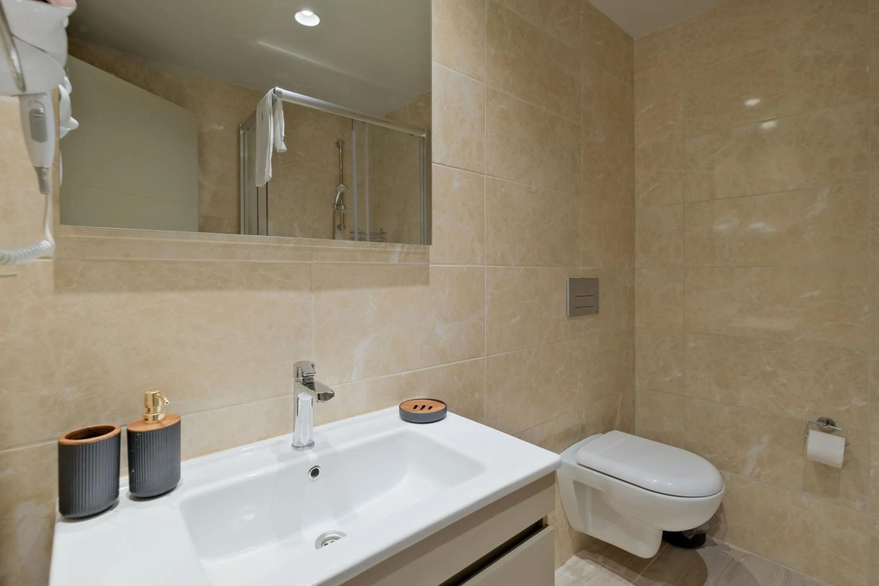 Bathroom in New Inn Hotel Cadde 54 Mall