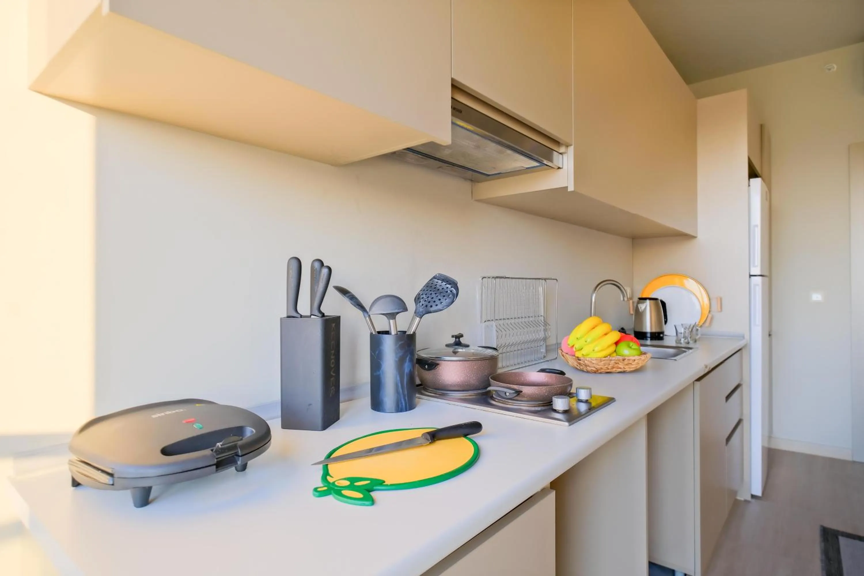 Kitchen or kitchenette in New Inn Hotel Cadde 54 Mall