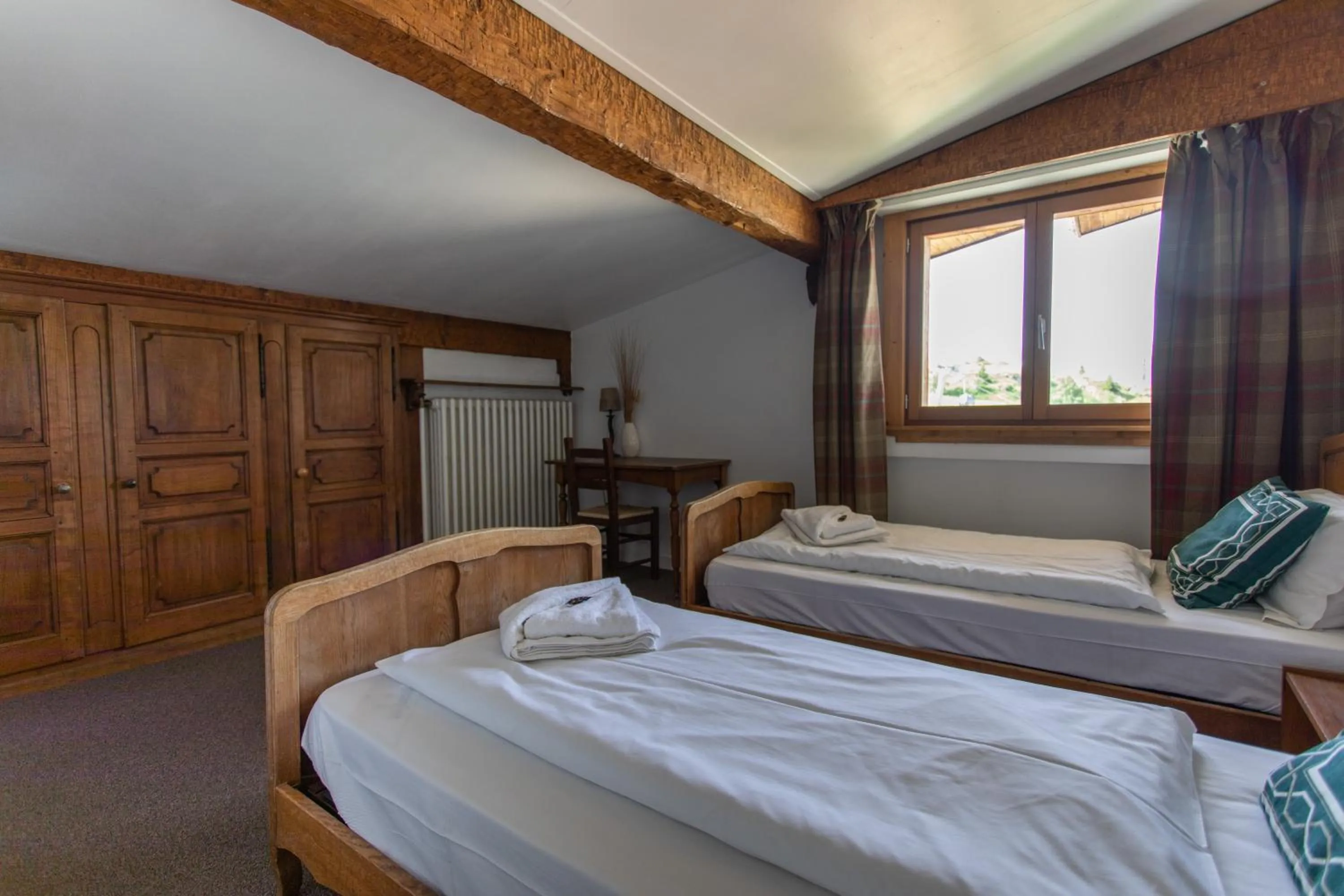 Bed in Hotel le Chamois