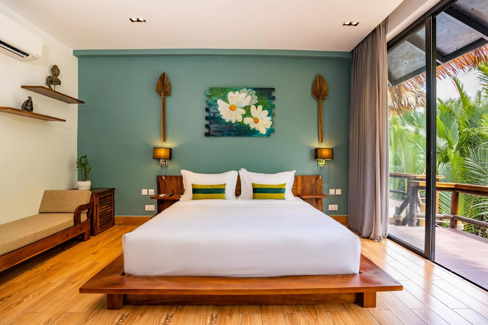 Bed in RiverTree Villa & Resort