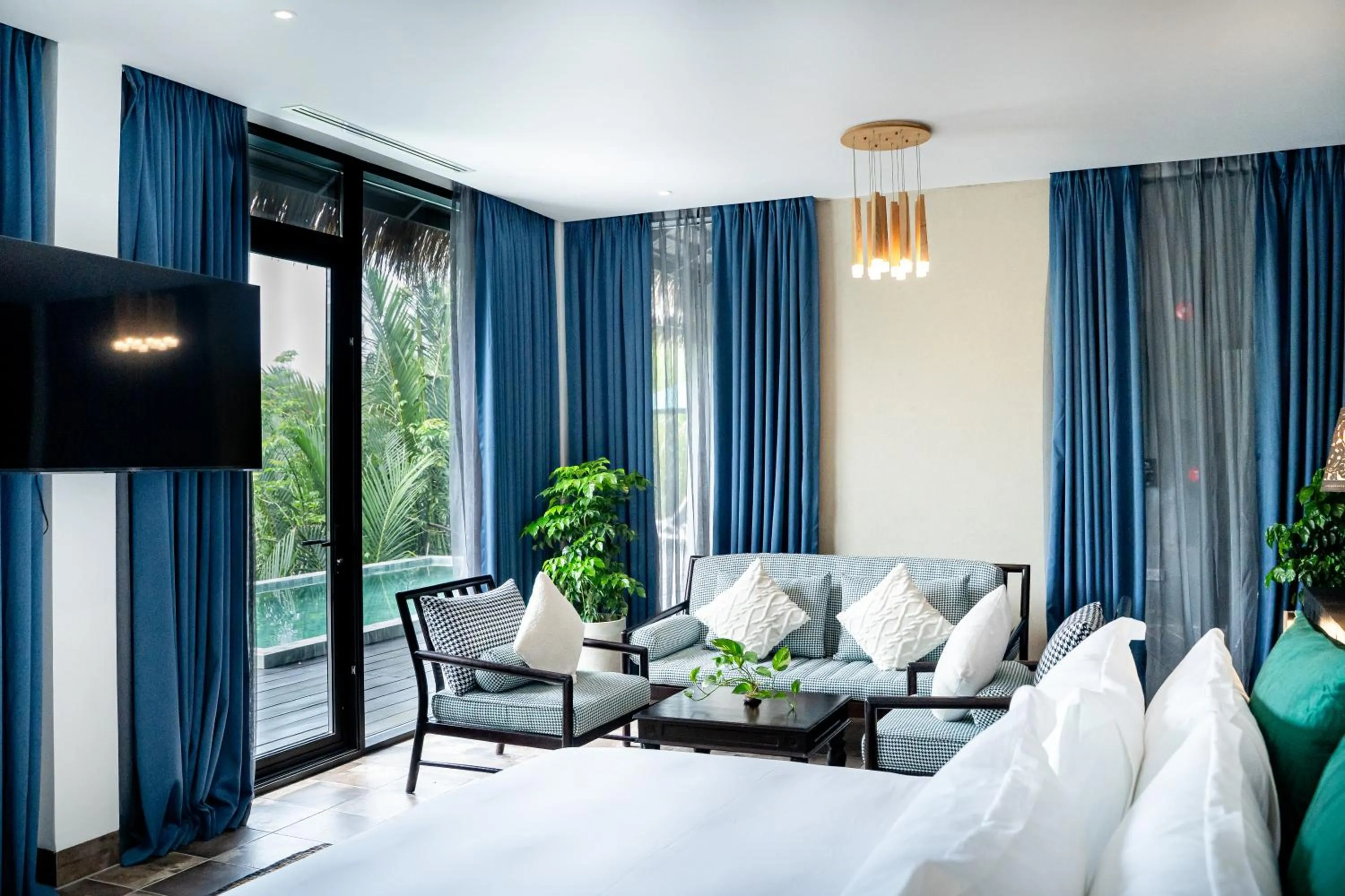 Living room, Bed in RiverTree Villa & Resort