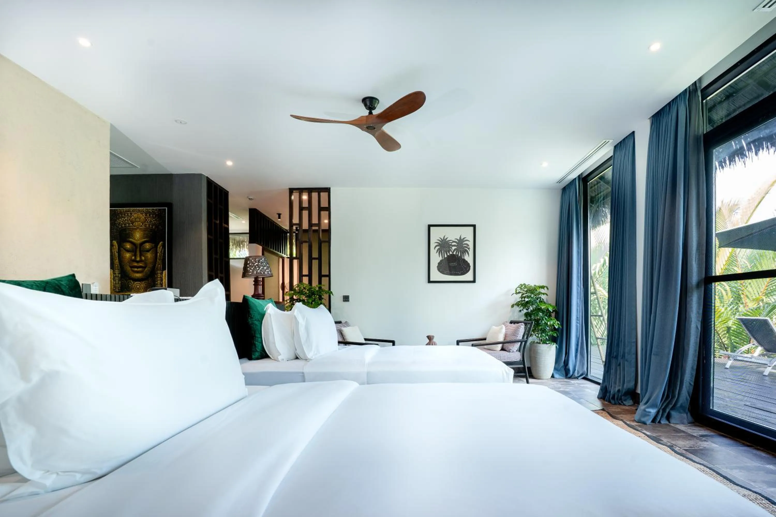 Bed in RiverTree Villa & Resort