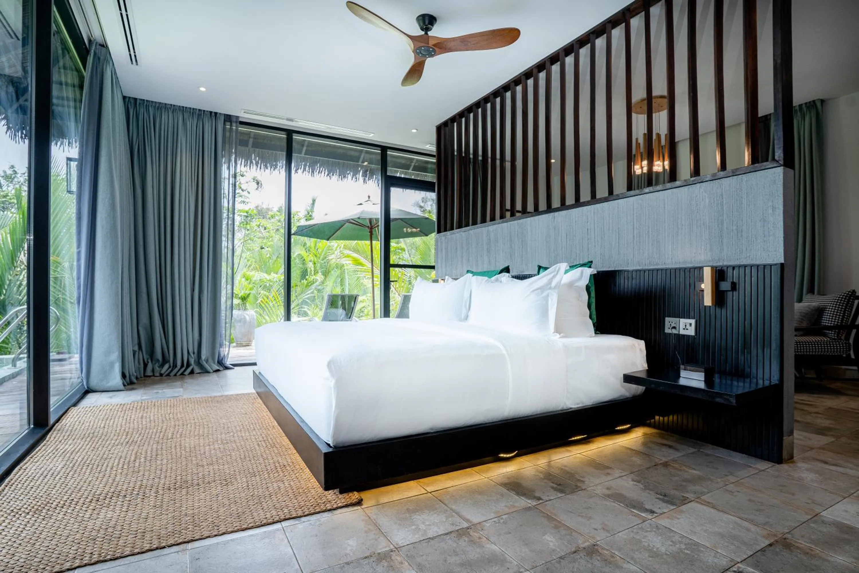 Bed in RiverTree Villa & Resort