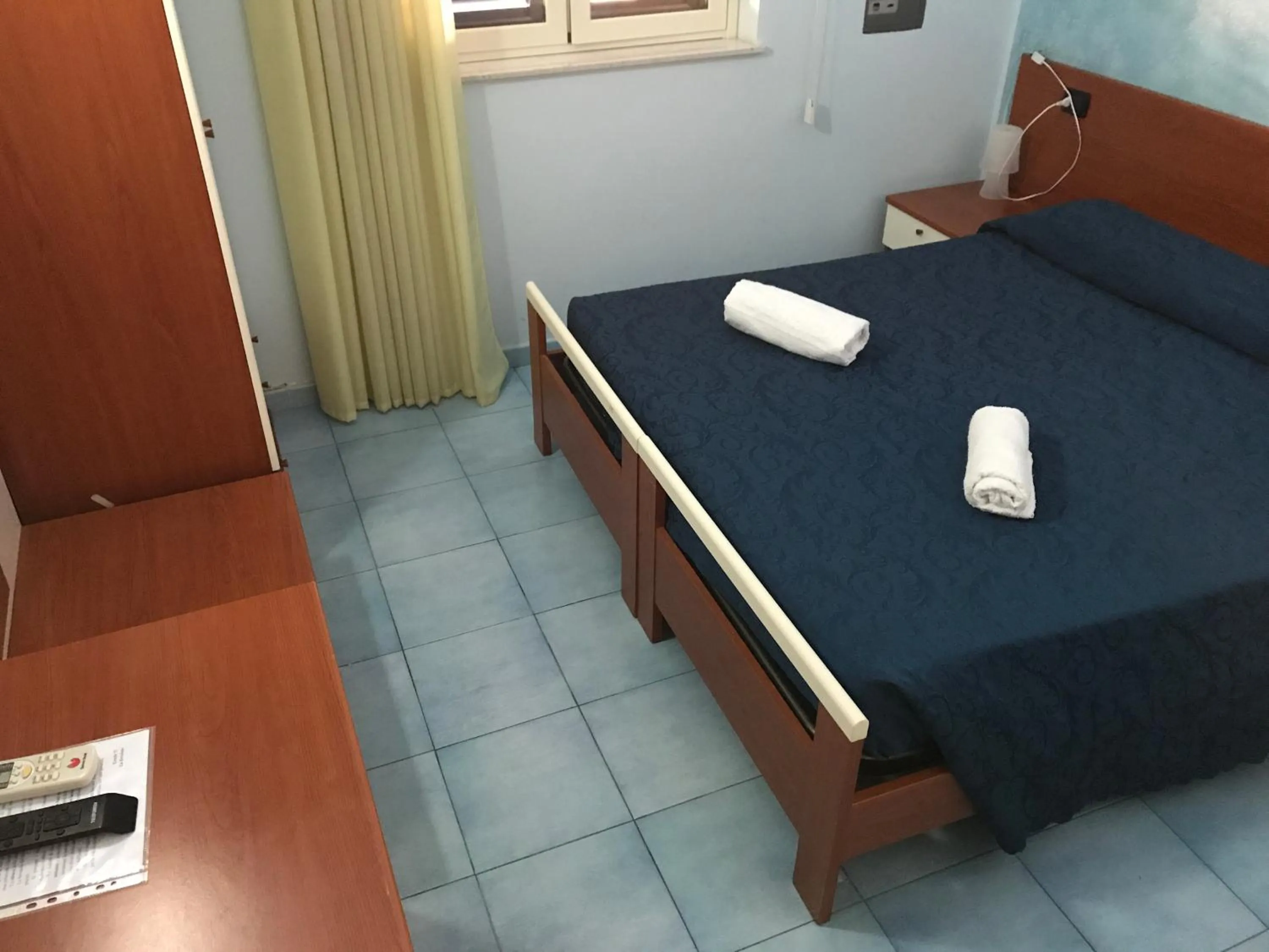 Bed in Megaron Hotel