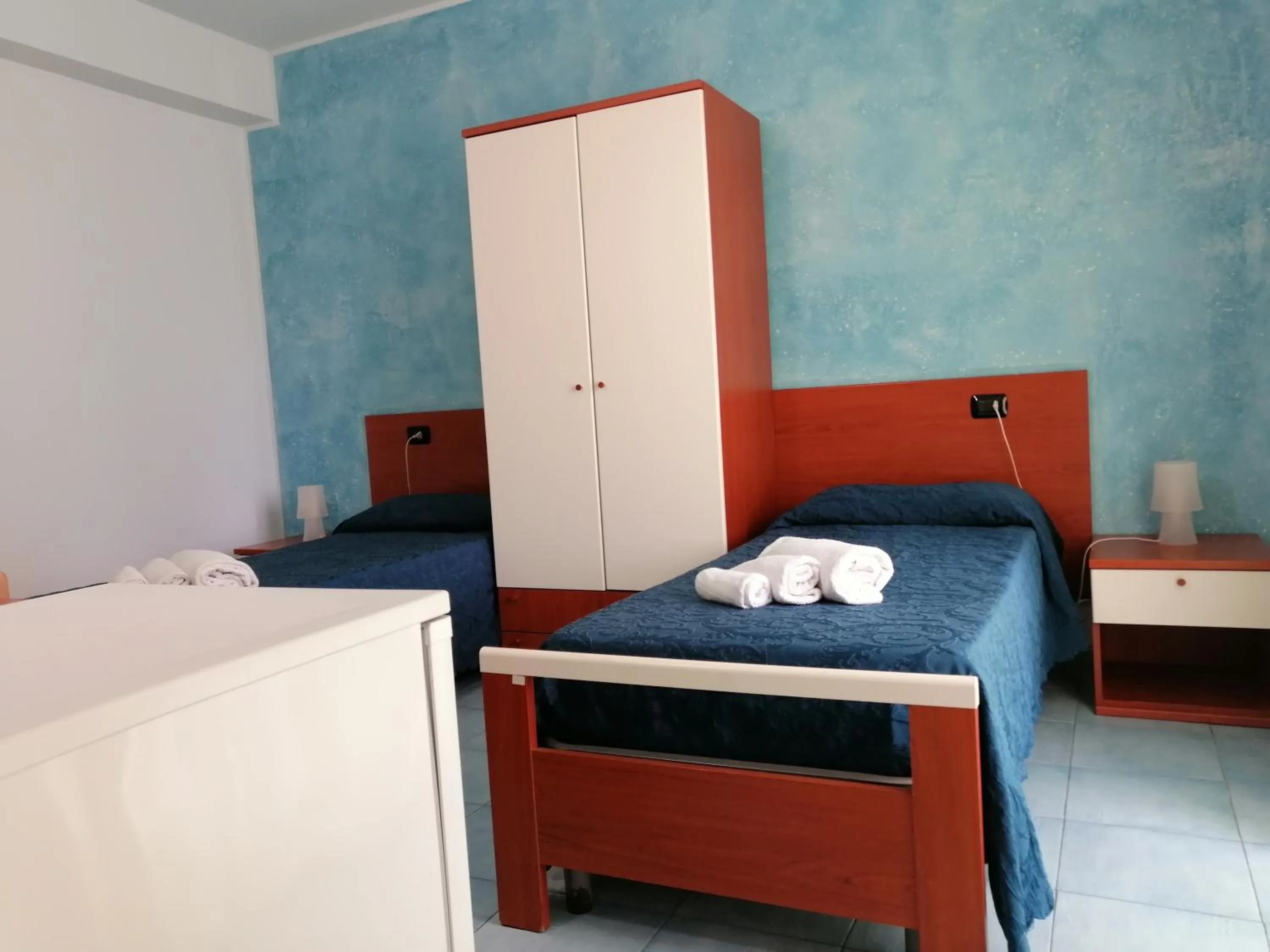 Bedroom in Megaron Hotel