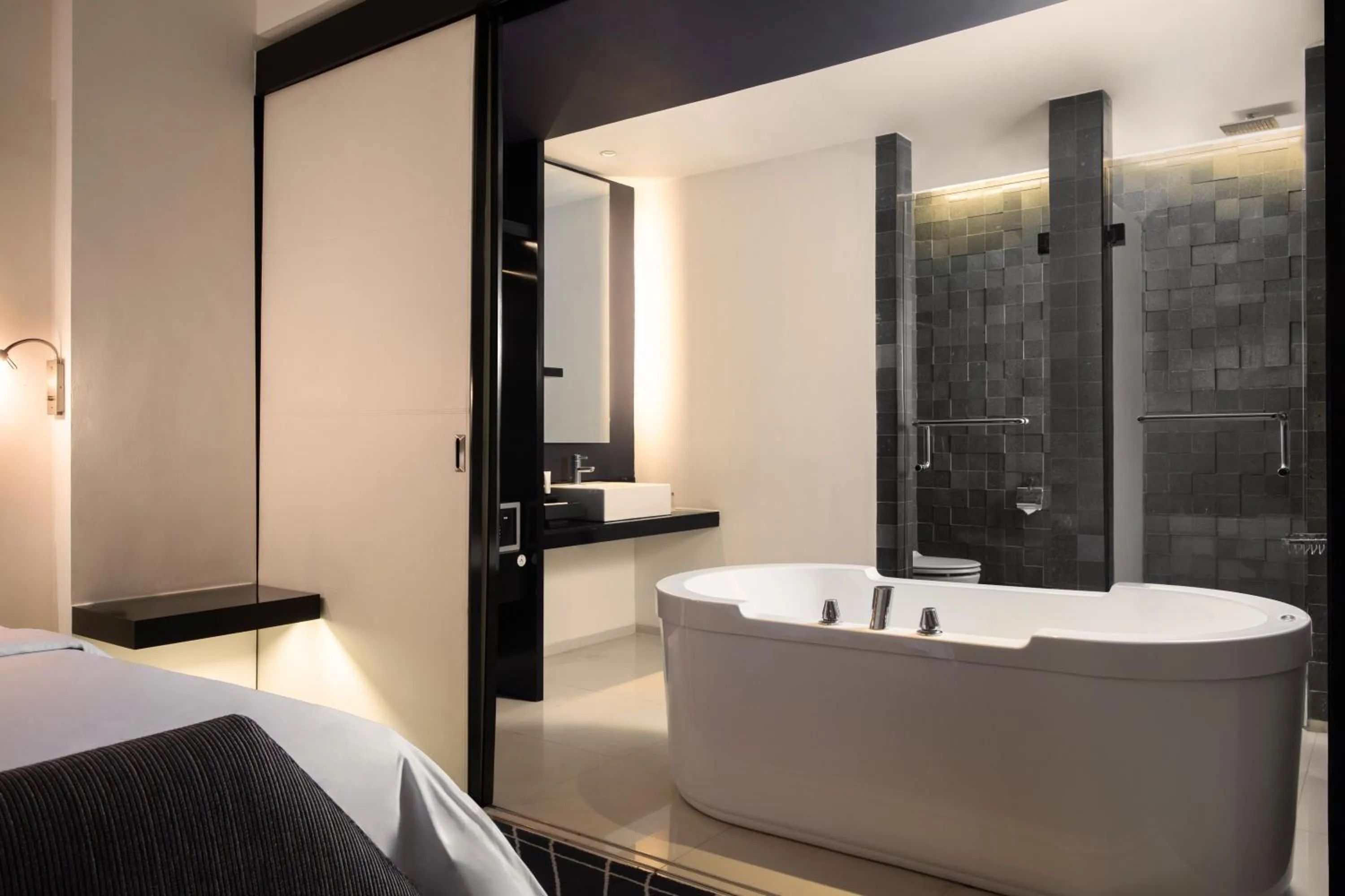 Bathroom, Bed in ARTOTEL TS Suites Surabaya