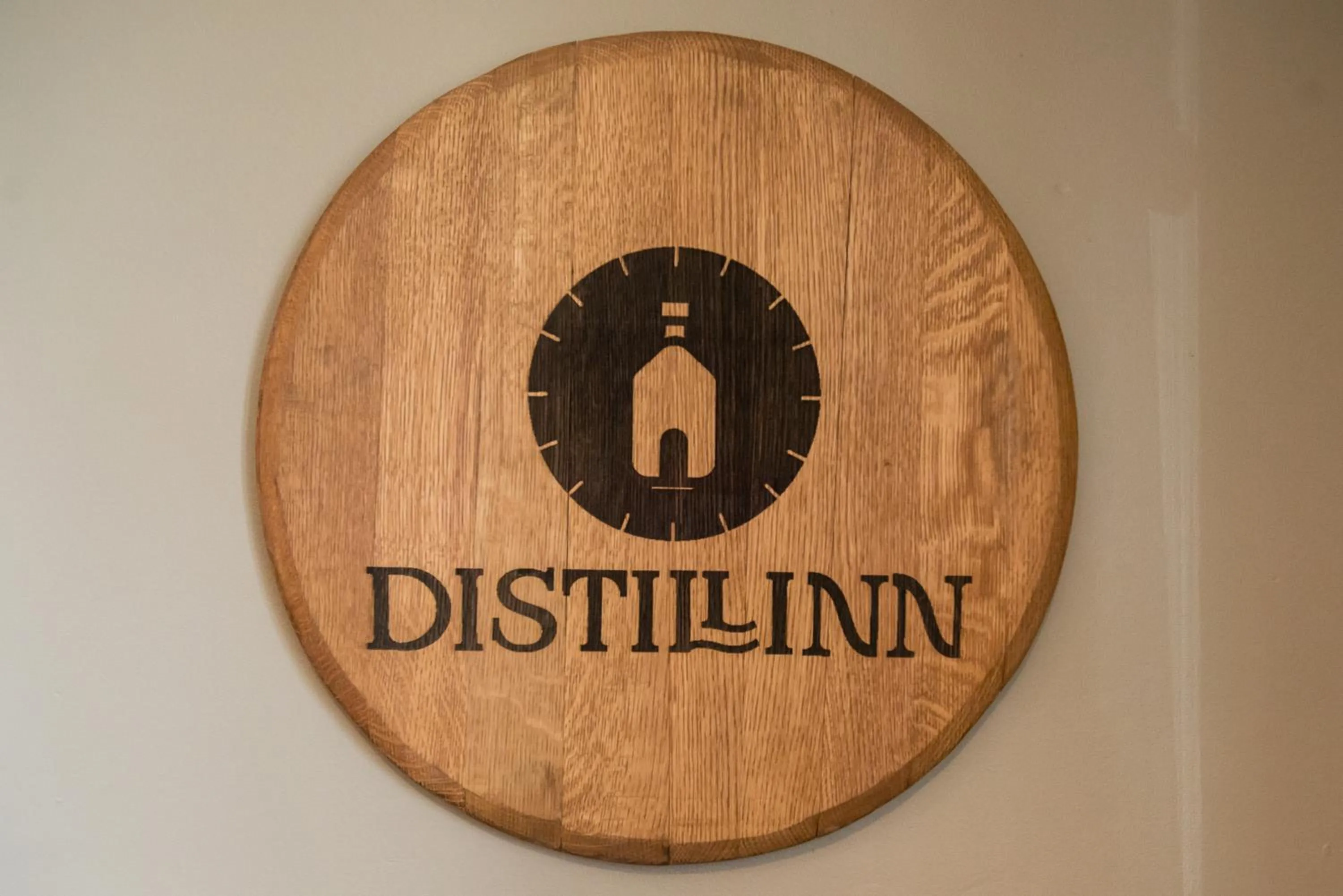 Property logo or sign in Distill-Inn