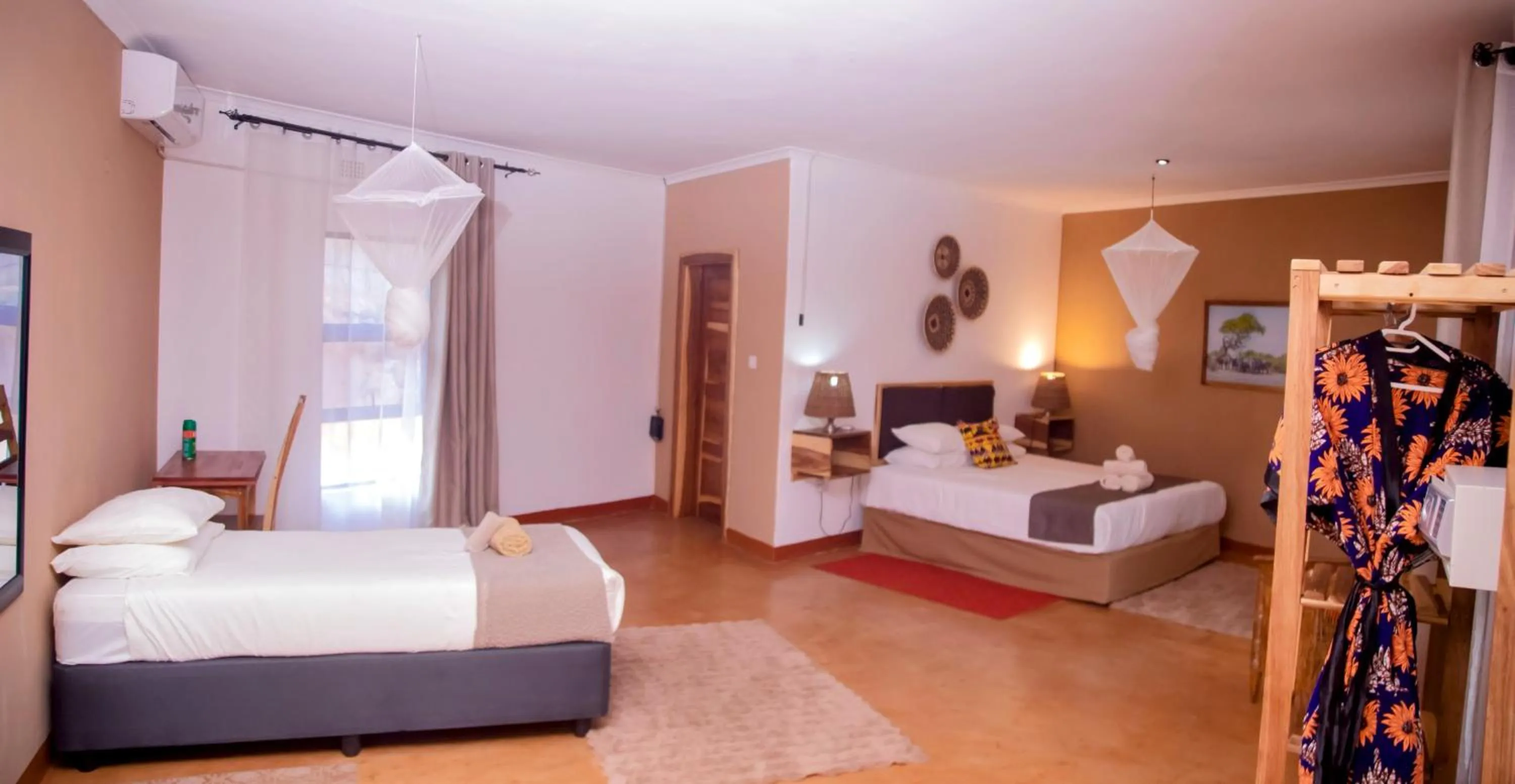 Bedroom, Bed in The Nkhosi Livingstone Lodge and Spa