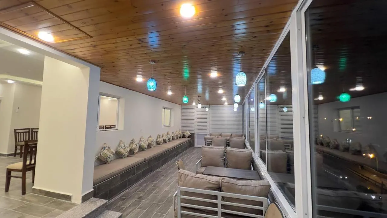 Seating area in Beit Alshabaan Inn
