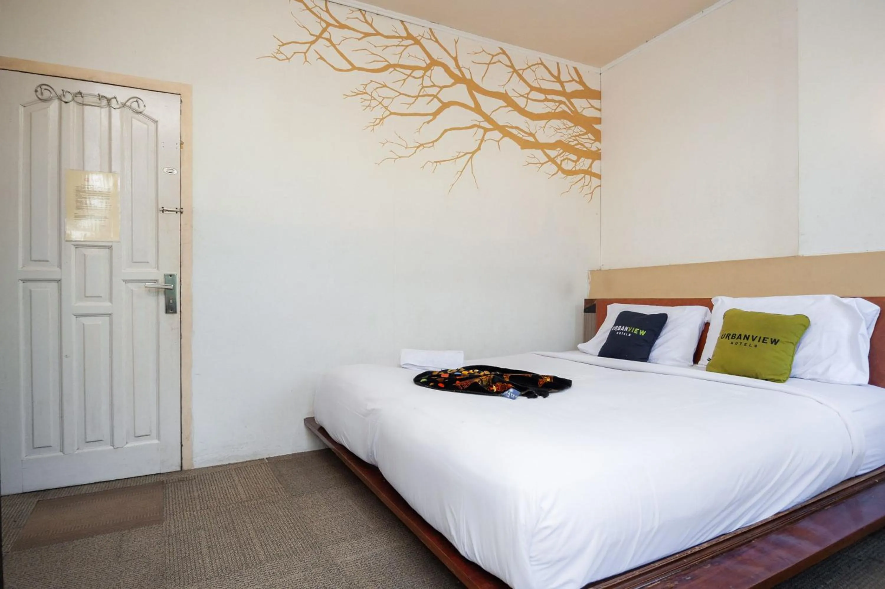 Bedroom, Bed in Urbanview Hotel Ananda Syariah by RedDoorz