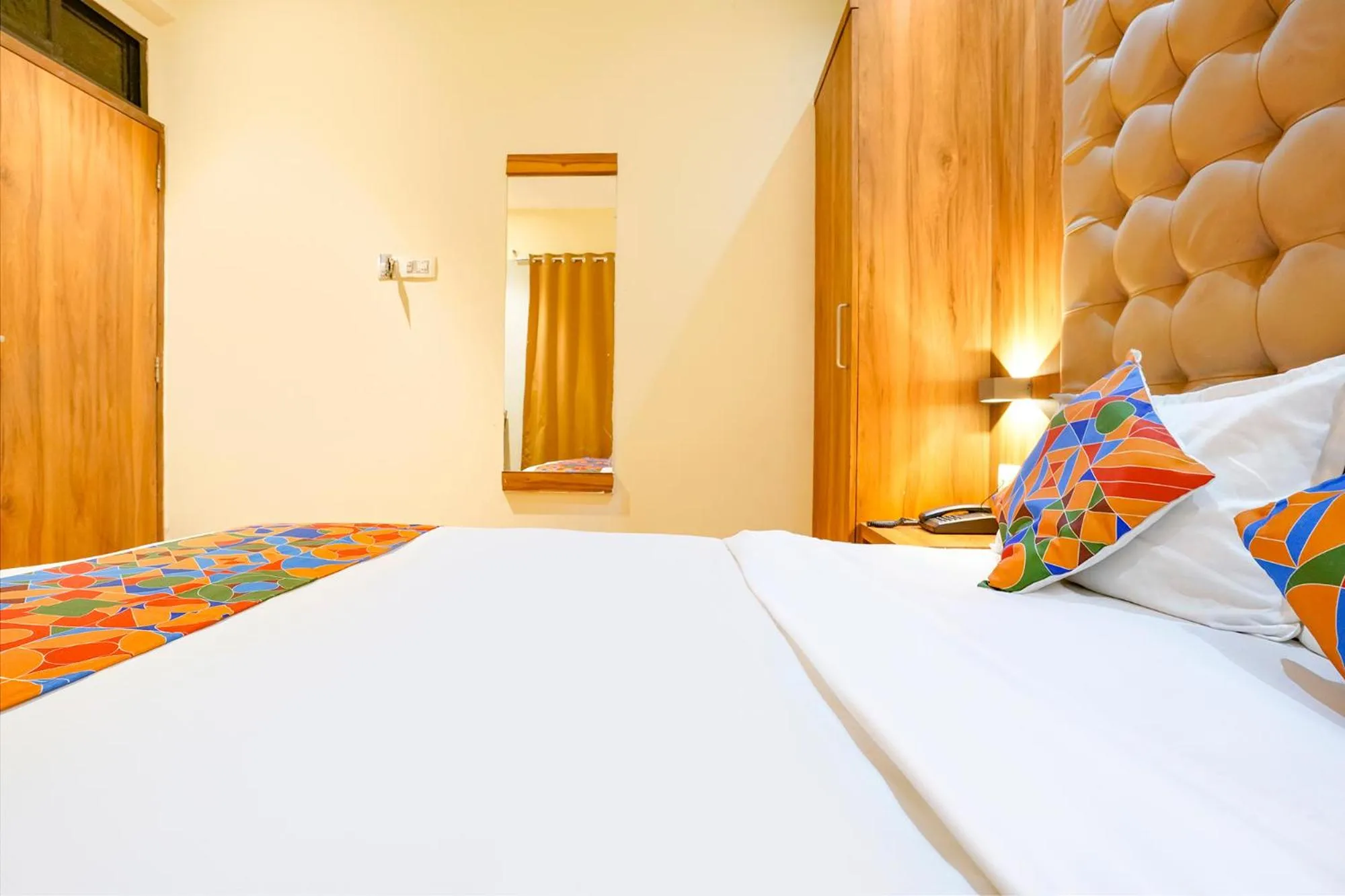 Bed in FabHotel Cozy Inn