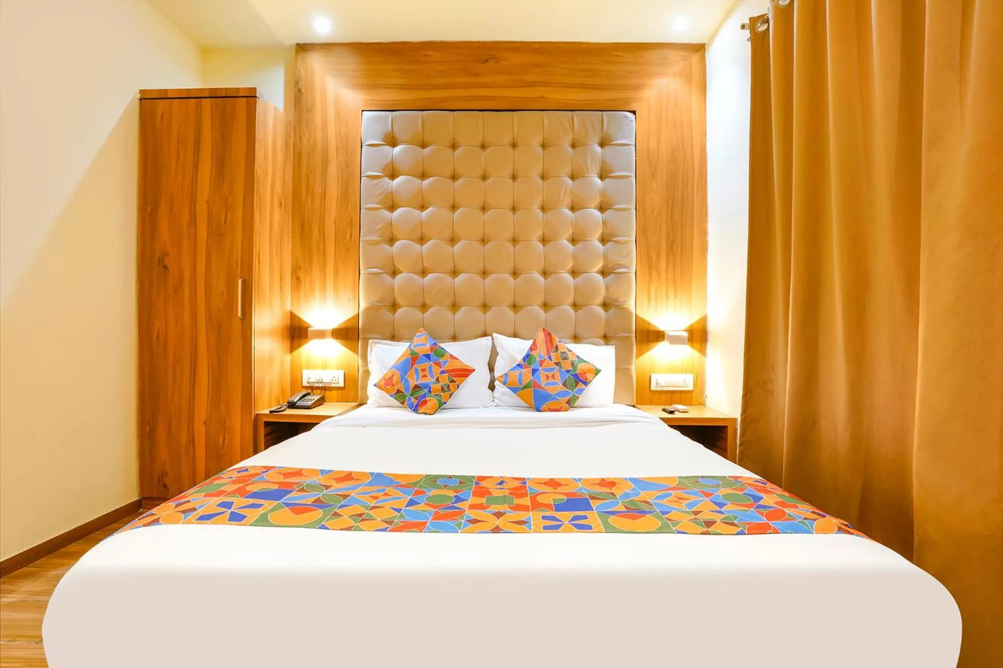 Bed in FabHotel Cozy Inn