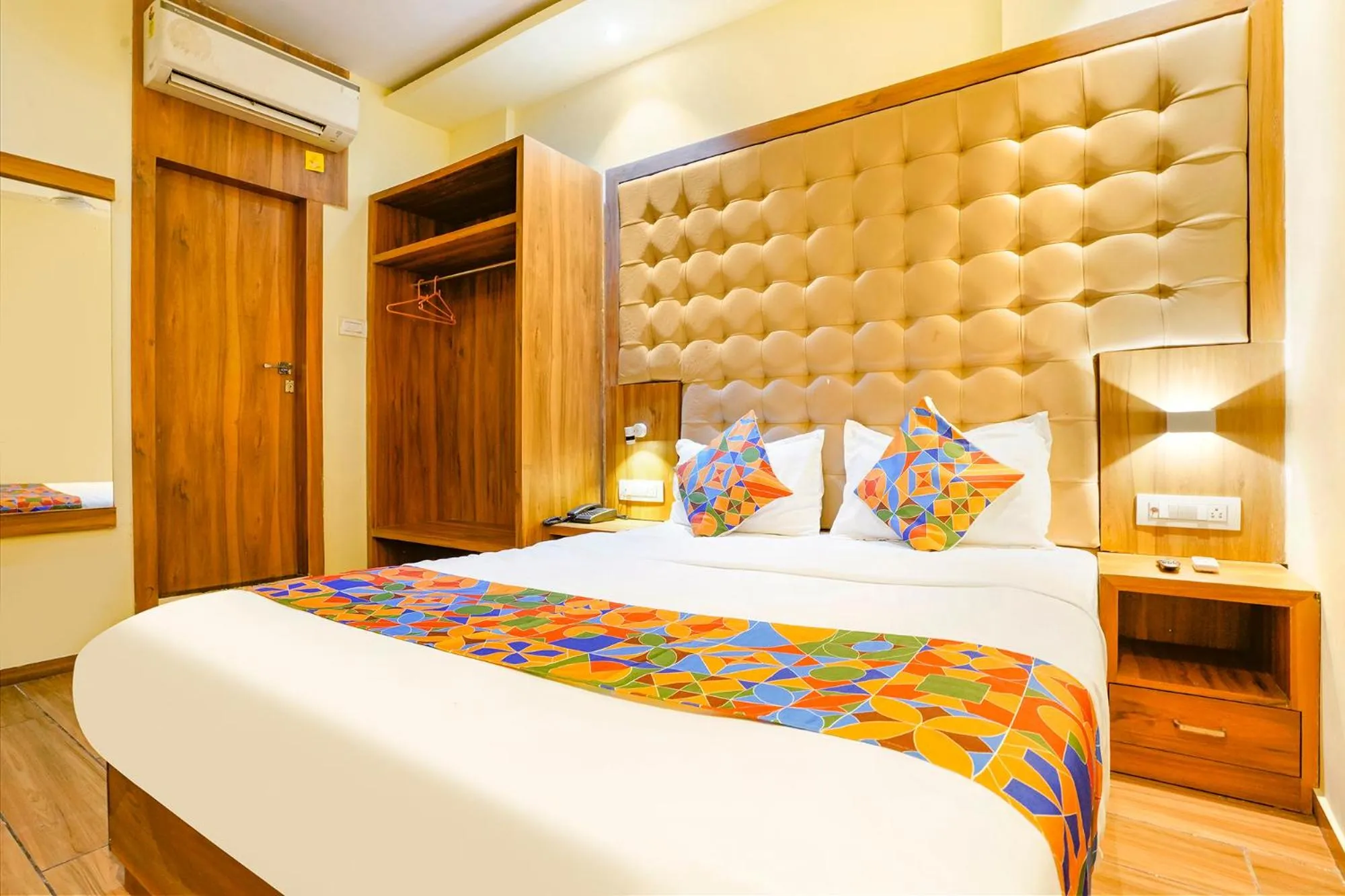 Bed in FabHotel Cozy Inn