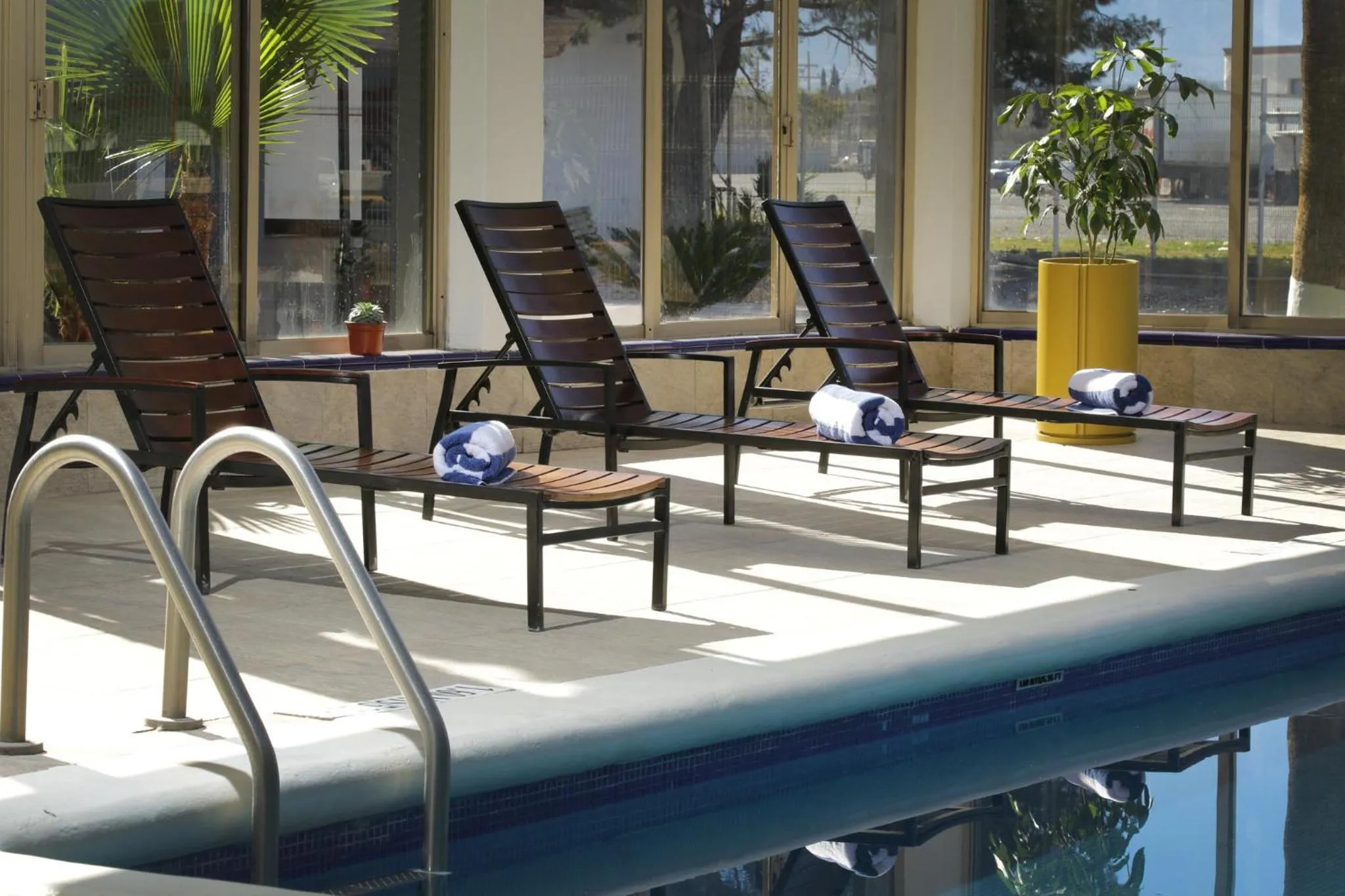 Swimming pool in voco Saltillo Suites by IHG