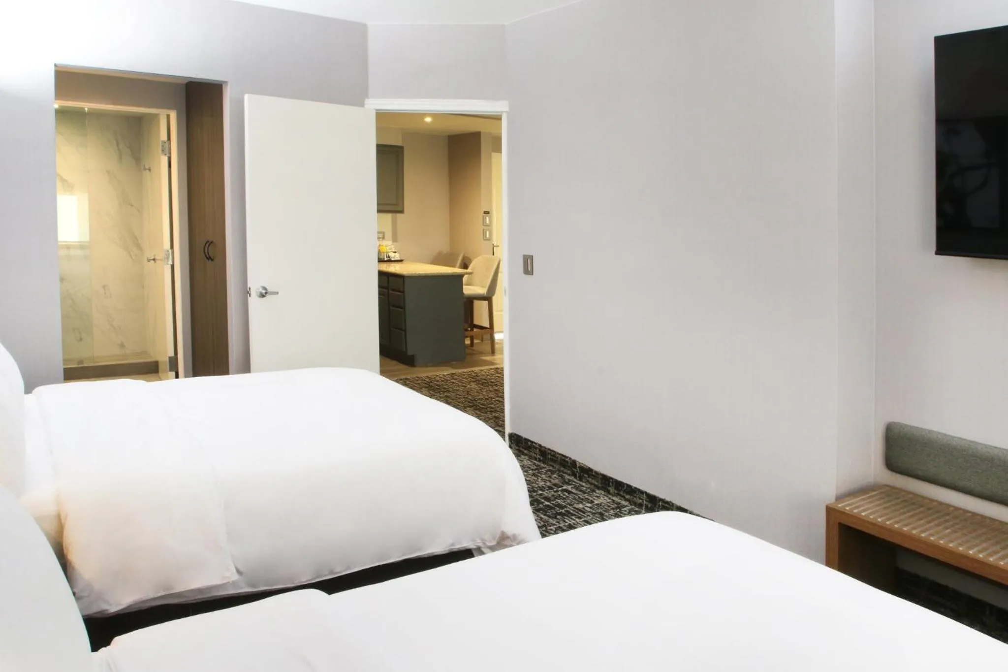 Photo of the whole room, Bed in voco Saltillo Suites by IHG