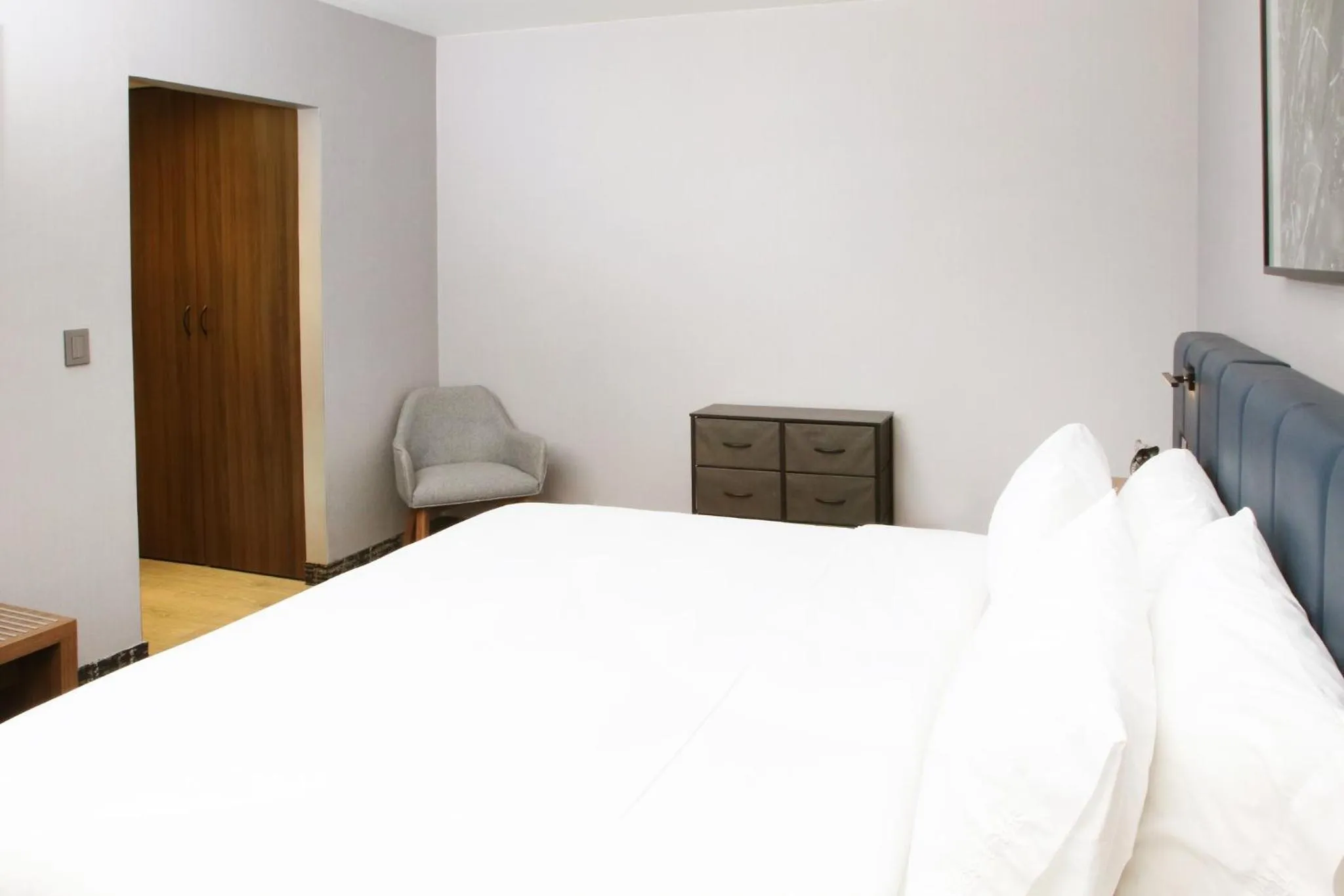 Photo of the whole room, Bed in voco Saltillo Suites by IHG