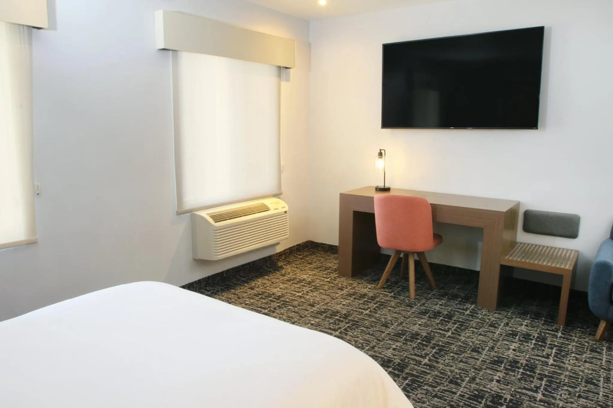 Photo of the whole room, Bed in voco Saltillo Suites by IHG