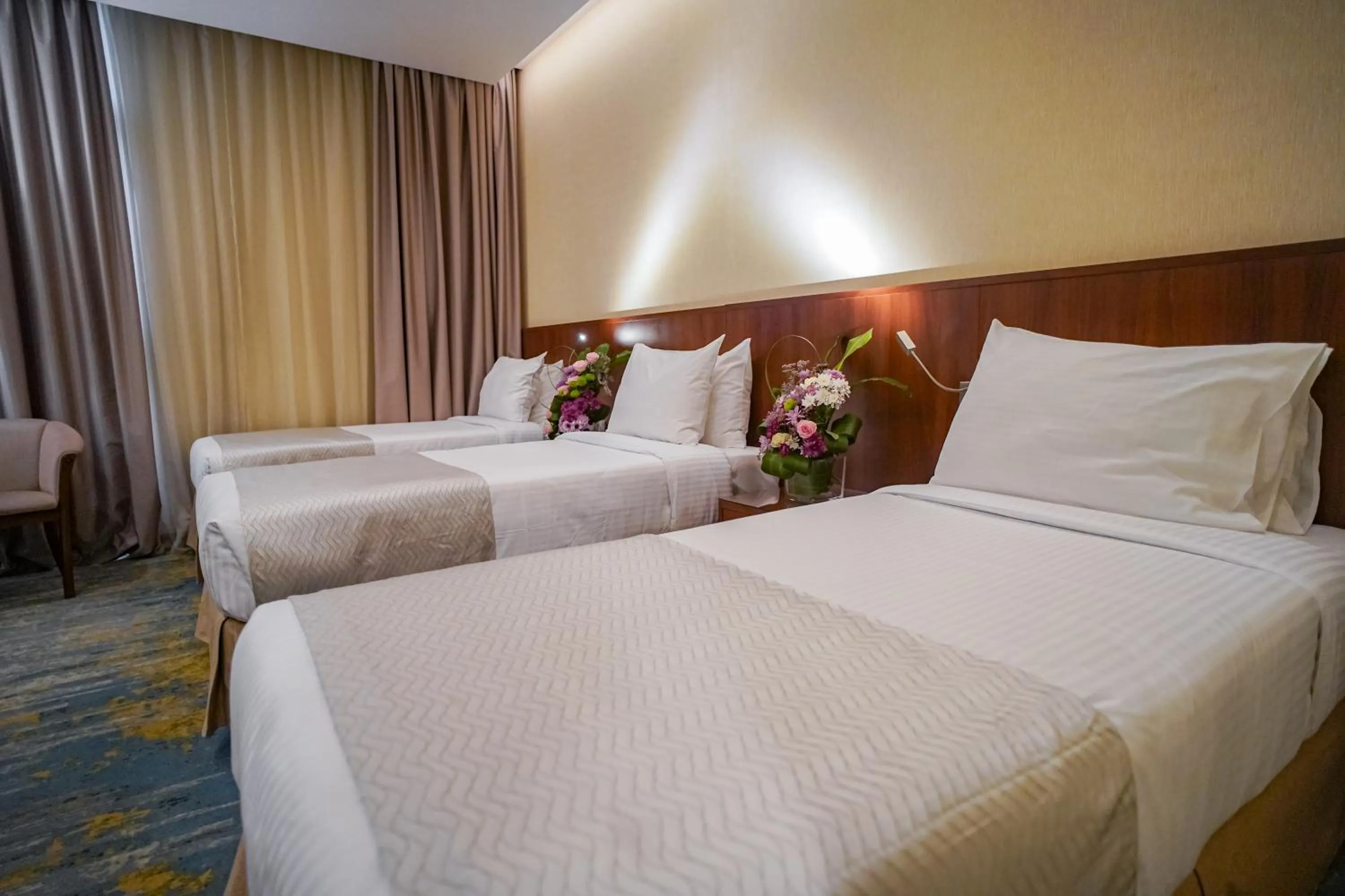 Bed in Emaar Elite Hotel