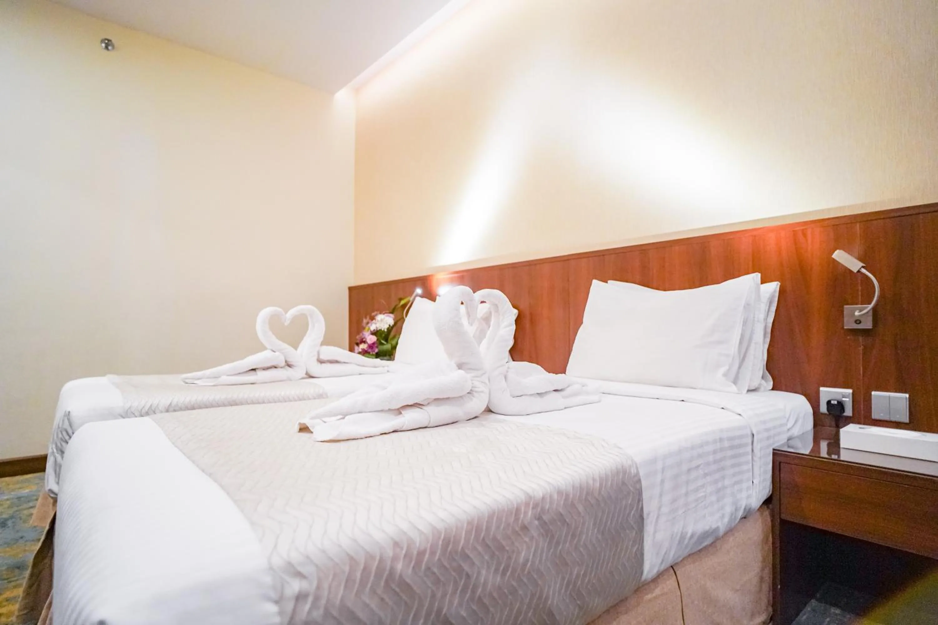 Bed in Emaar Elite Hotel