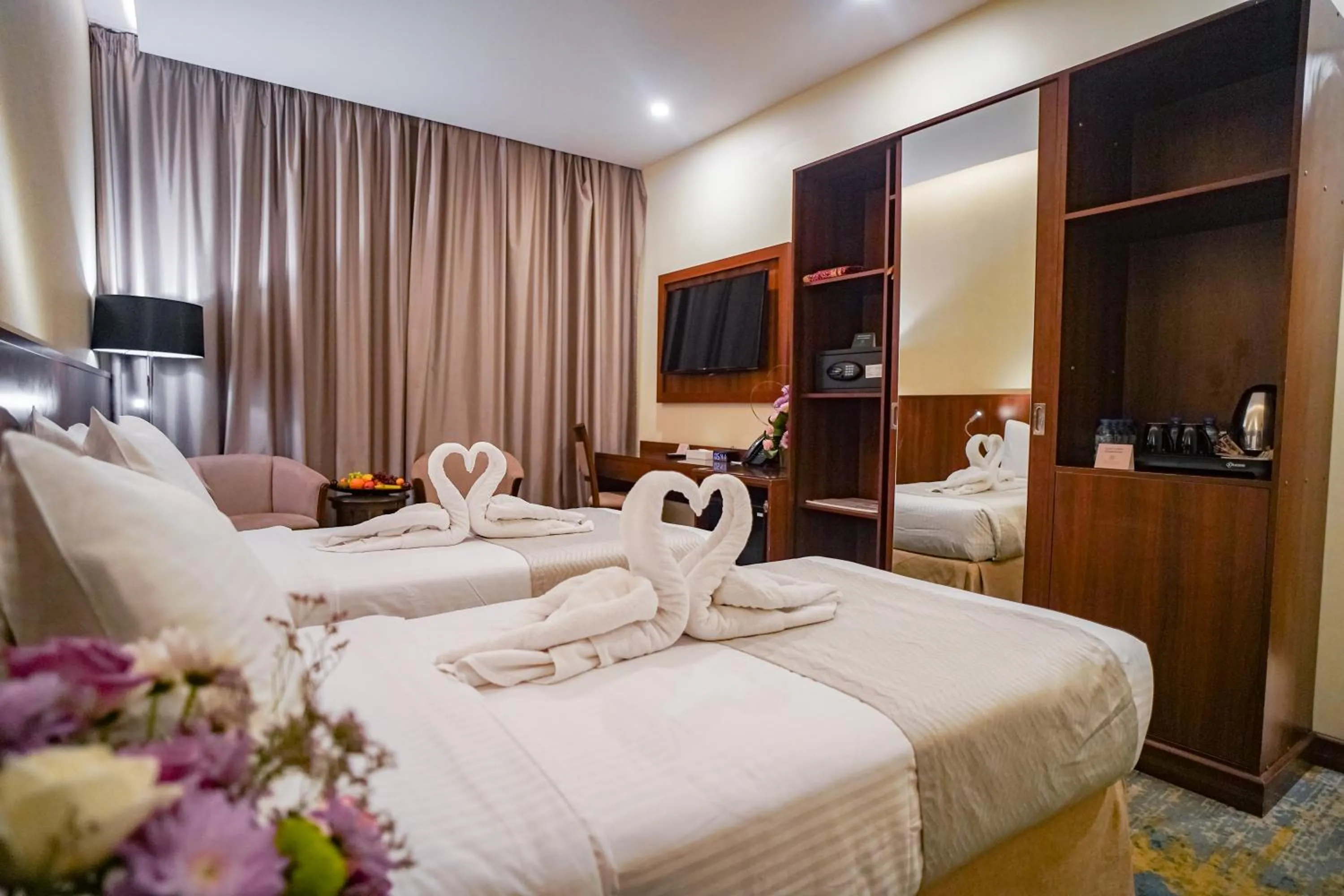 Bed in Emaar Elite Hotel