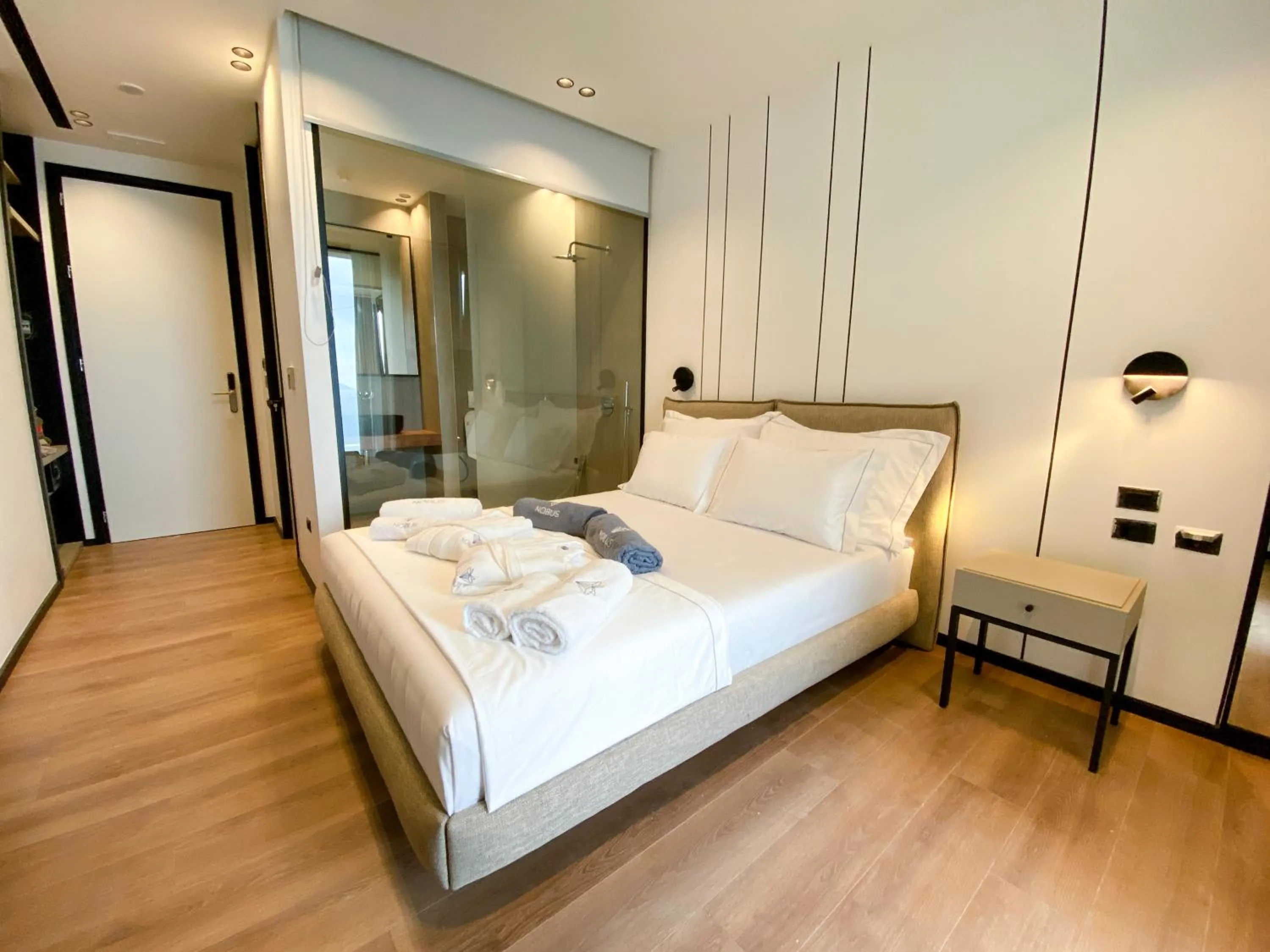 Bed in Nobus Hotel & Spa