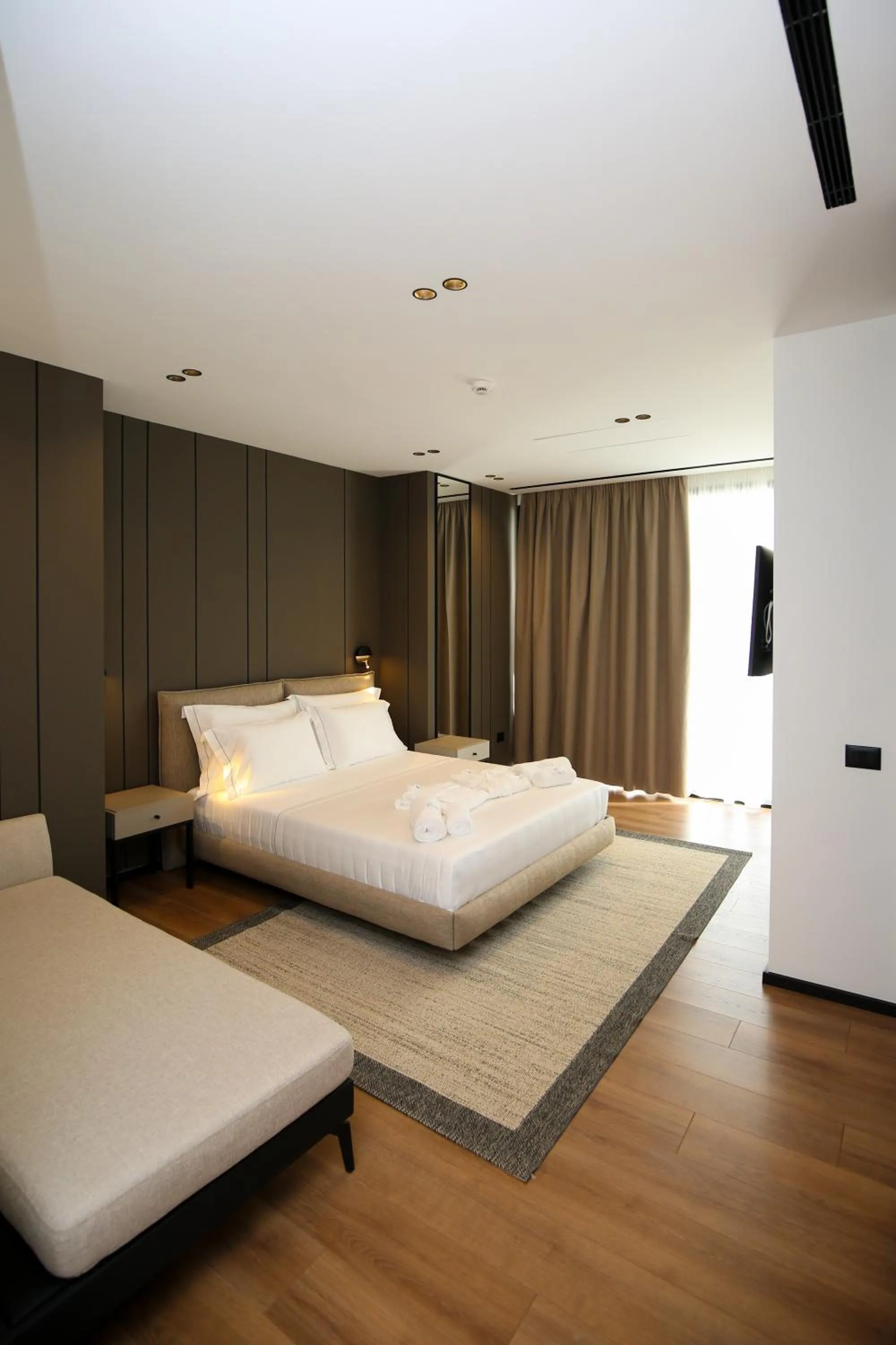 Bed in Nobus Hotel & Spa