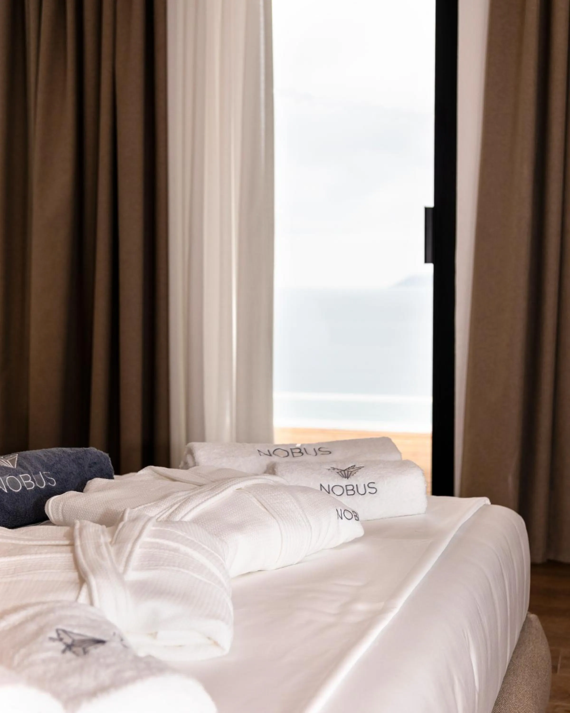 Bed in Nobus Hotel & Spa