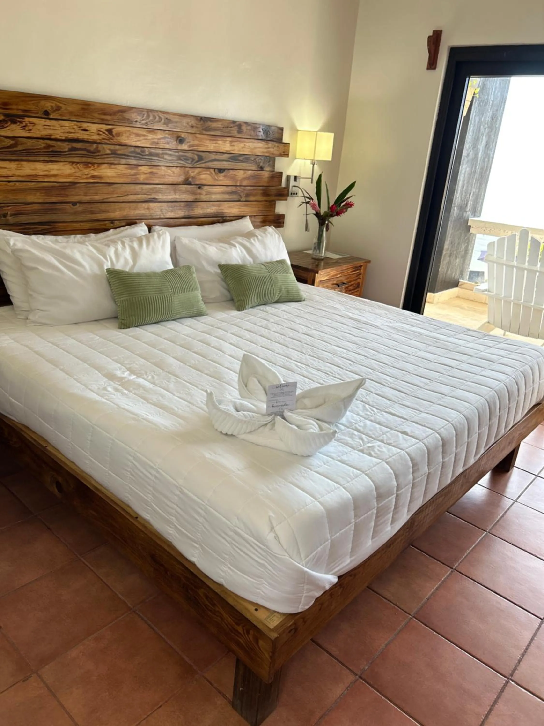 Bed in Brisas Del Mar Beach + Dive Resort